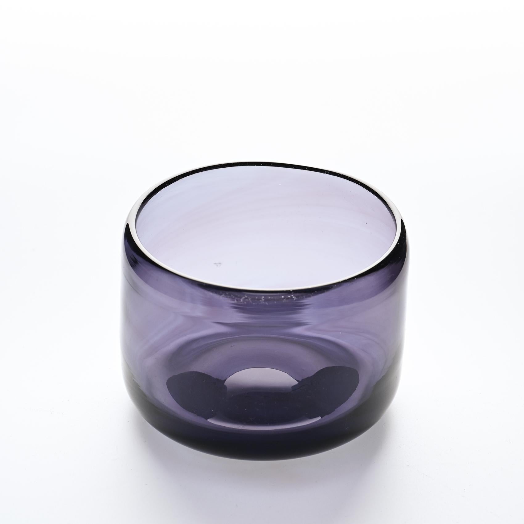 Claude Morin, a talented French artist, is recognized as one of the key figures in the renewal of the Art of Glass in France. In the 1970s, he established his studio in Dieulefit, where he refined his techniques and developed a distinctive style of