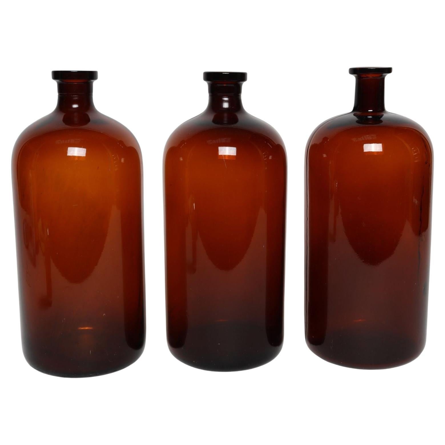 Set di tre bottiglie da farmacia in vetro ambrato vintage di Owens Illinois Glass Co.