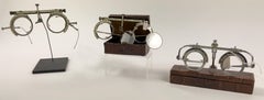 Set of three vintage/antique brass/steel optometrist optometry eyeglasses