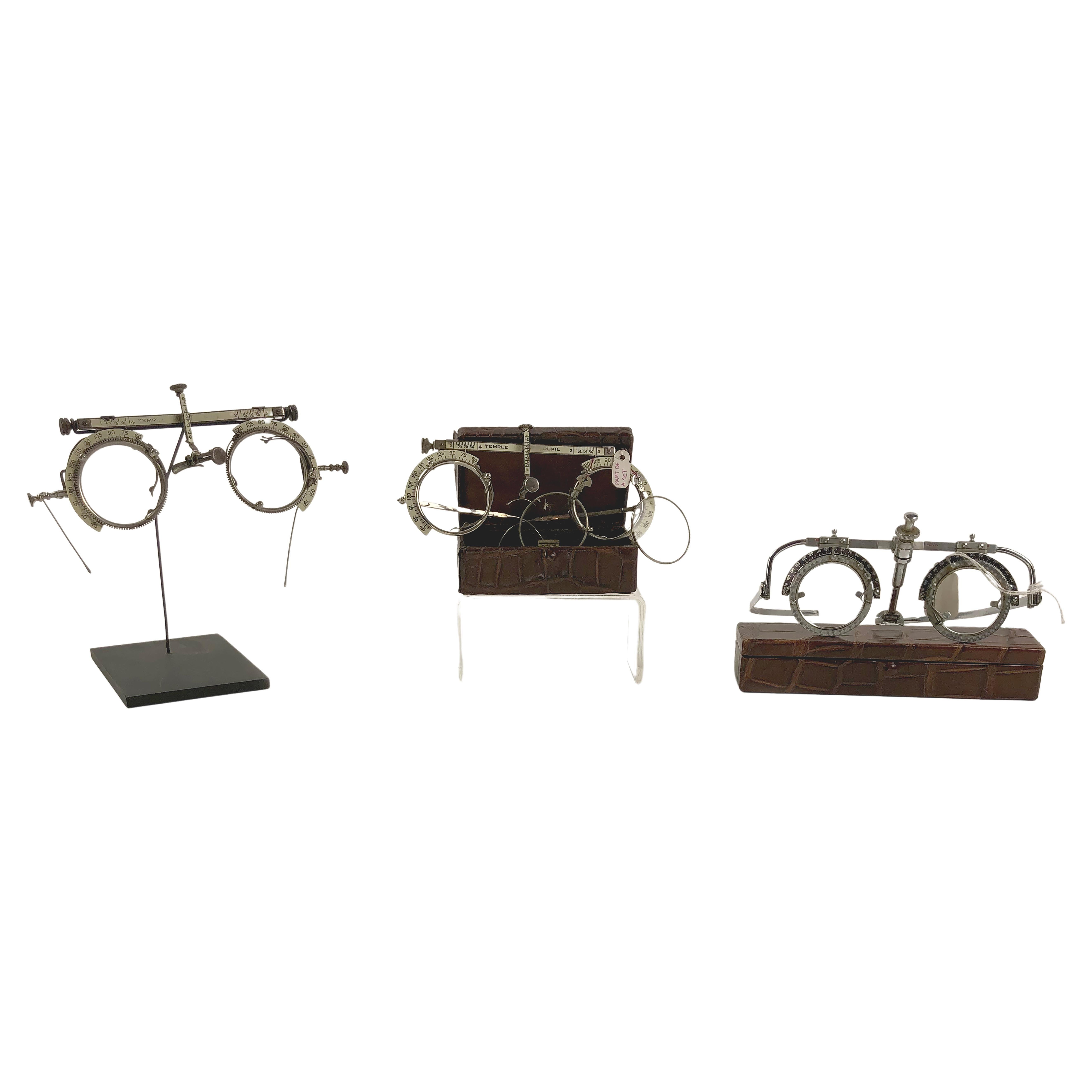 Set of three vintage/antique brass/steel optometrist optometry eyeglasses For Sale
