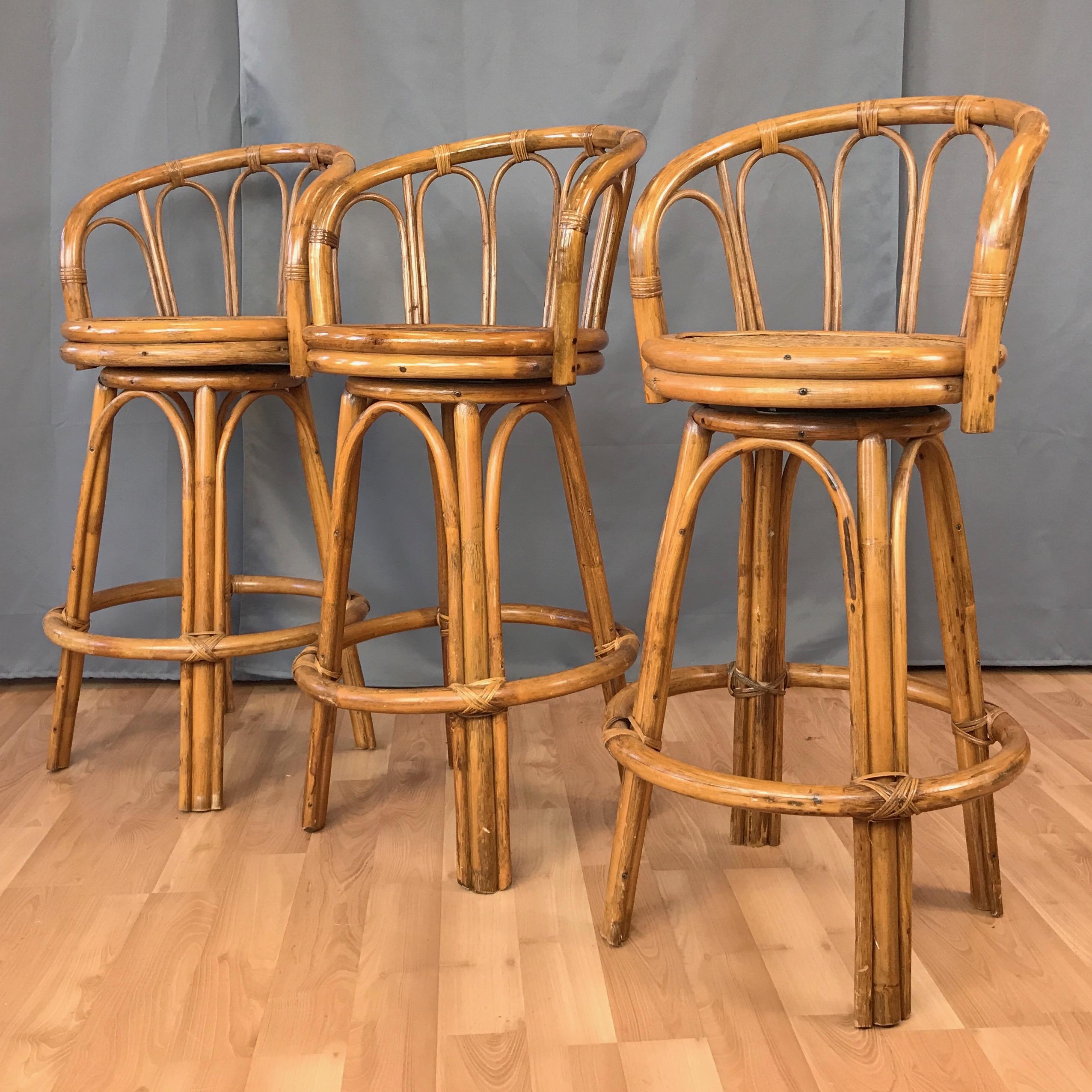Set of Three Vintage Bamboo and Rattan Swivel Barstools In Good Condition In San Francisco, CA
