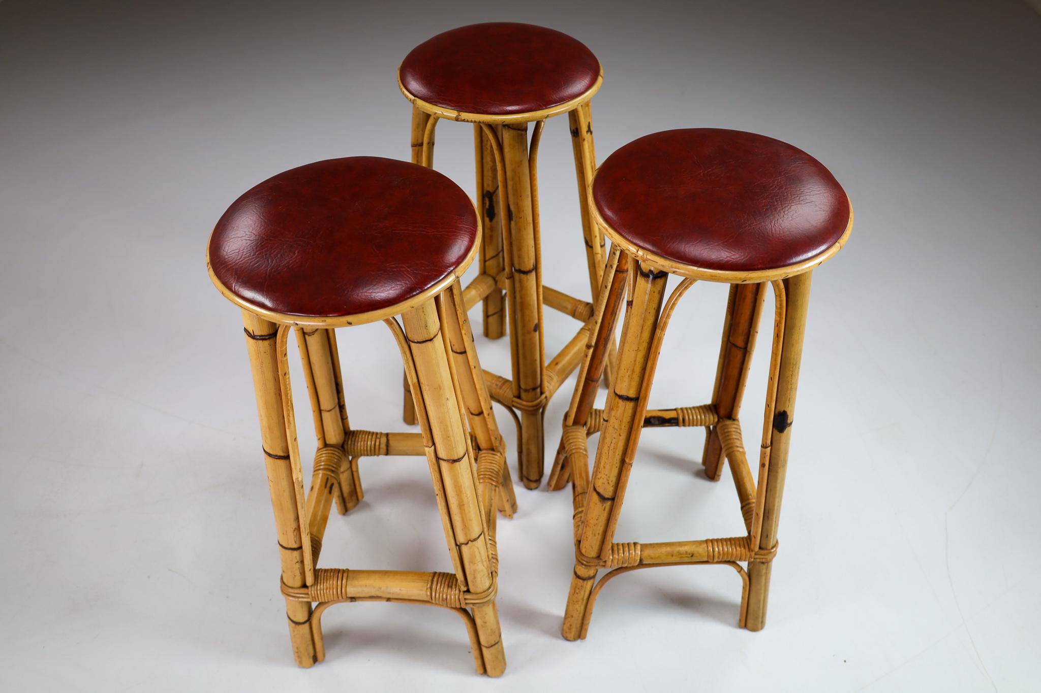 Mid-20th Century Set of Three Vintage Bamboo Barstools with Red Leather Seat, France, 1950s