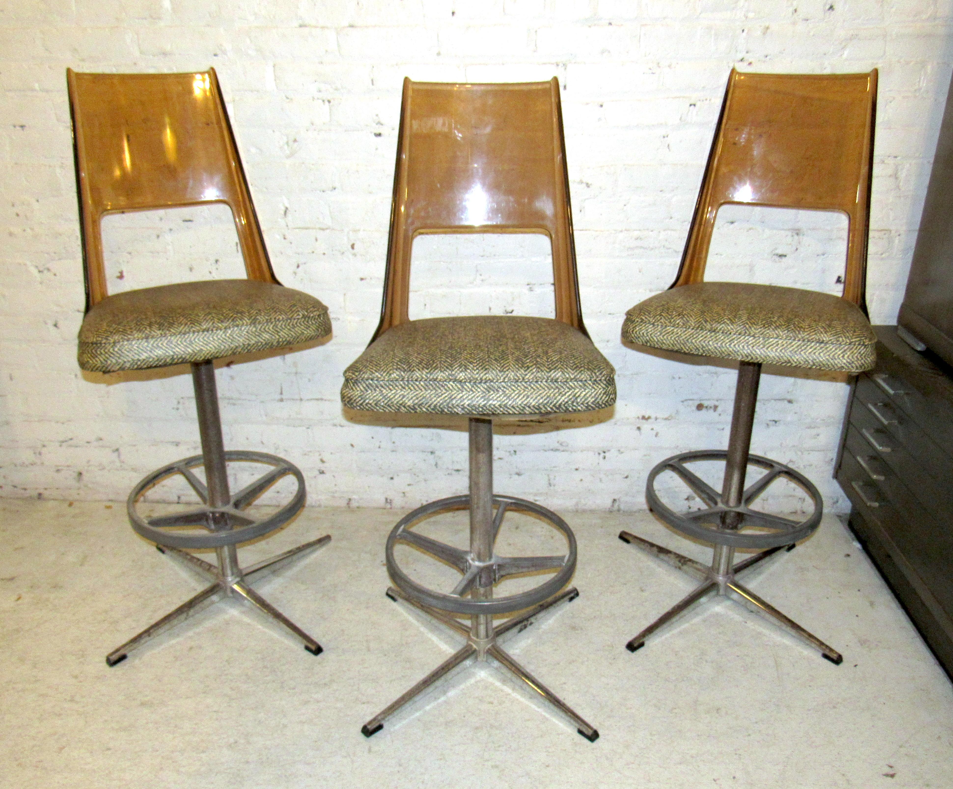 Vintage modern set of three stools featuring a vinyl seat and Lucite backrest on a sturdy metal frame.

(Please confirm item location NY or NJ with dealer).
