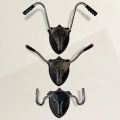 Set of Three Vintage Bicycle Seat and Handlebar Trophies