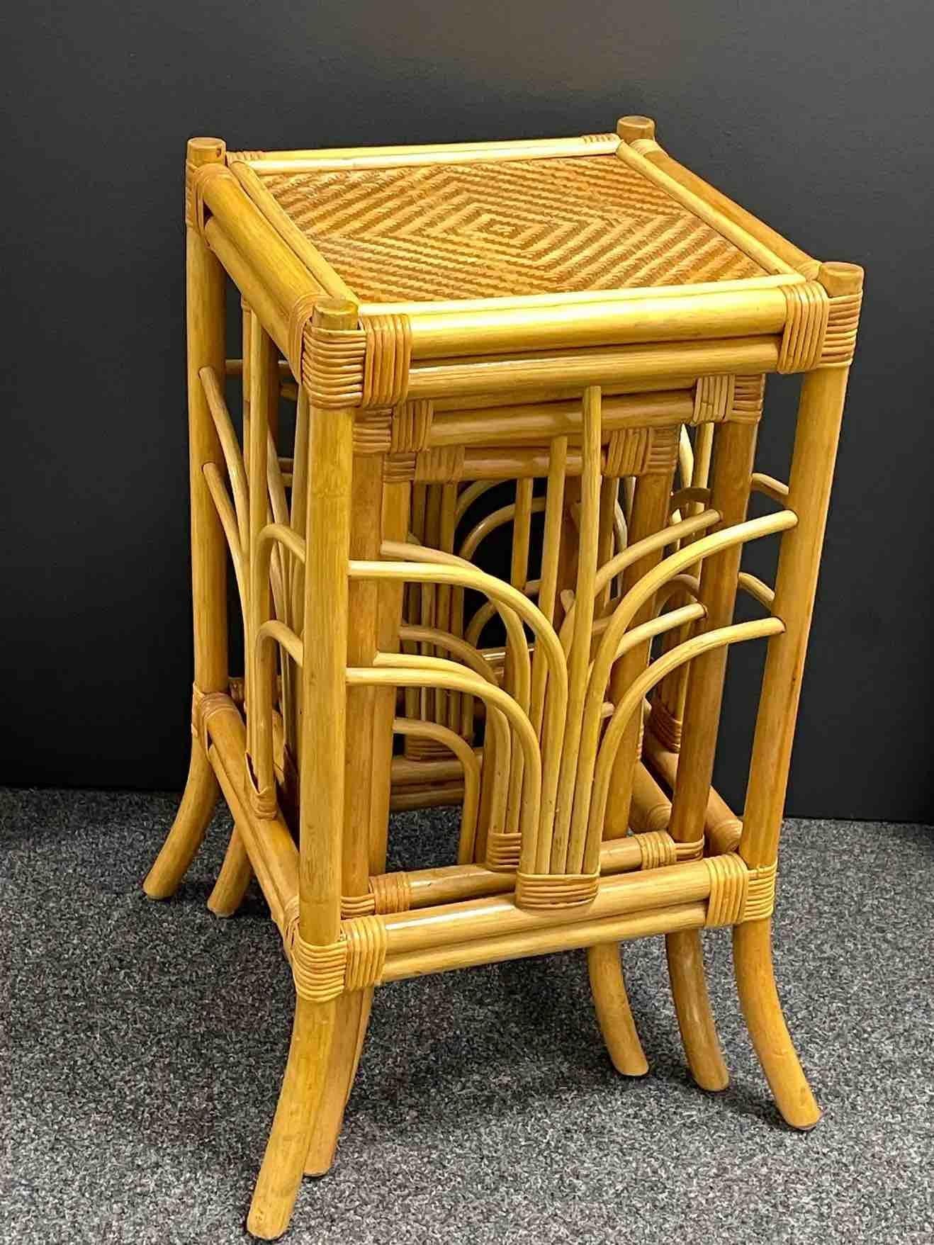 Handsome set of three vintage Bohemian bamboo plant stands. The group consists of three plant stands of graduating size. The trendy boho stands are made of rattan / bamboo. These are time capsule pieces in outstanding original condition. Absolutely