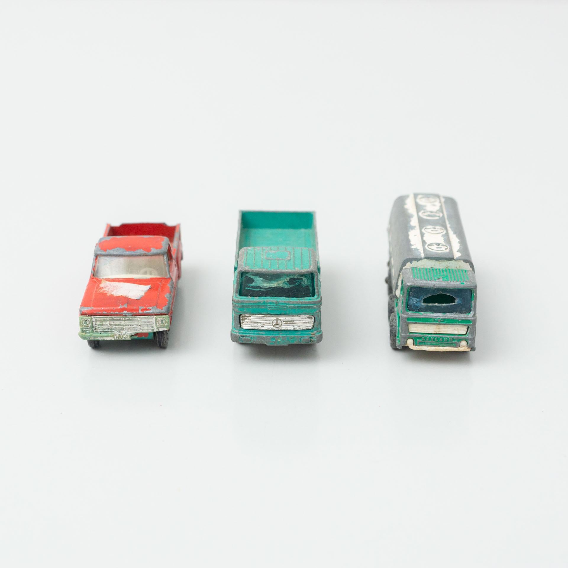 Set of three vintage toy cars.
By unnknown manufacturer, circa 1960.

In original condition, with minor wear consistent with age and use, preserving a beautiful patina.

Materials:
Metal
Plastic

Dimensions (each one):
D 7.5 cm x W 3 cm x