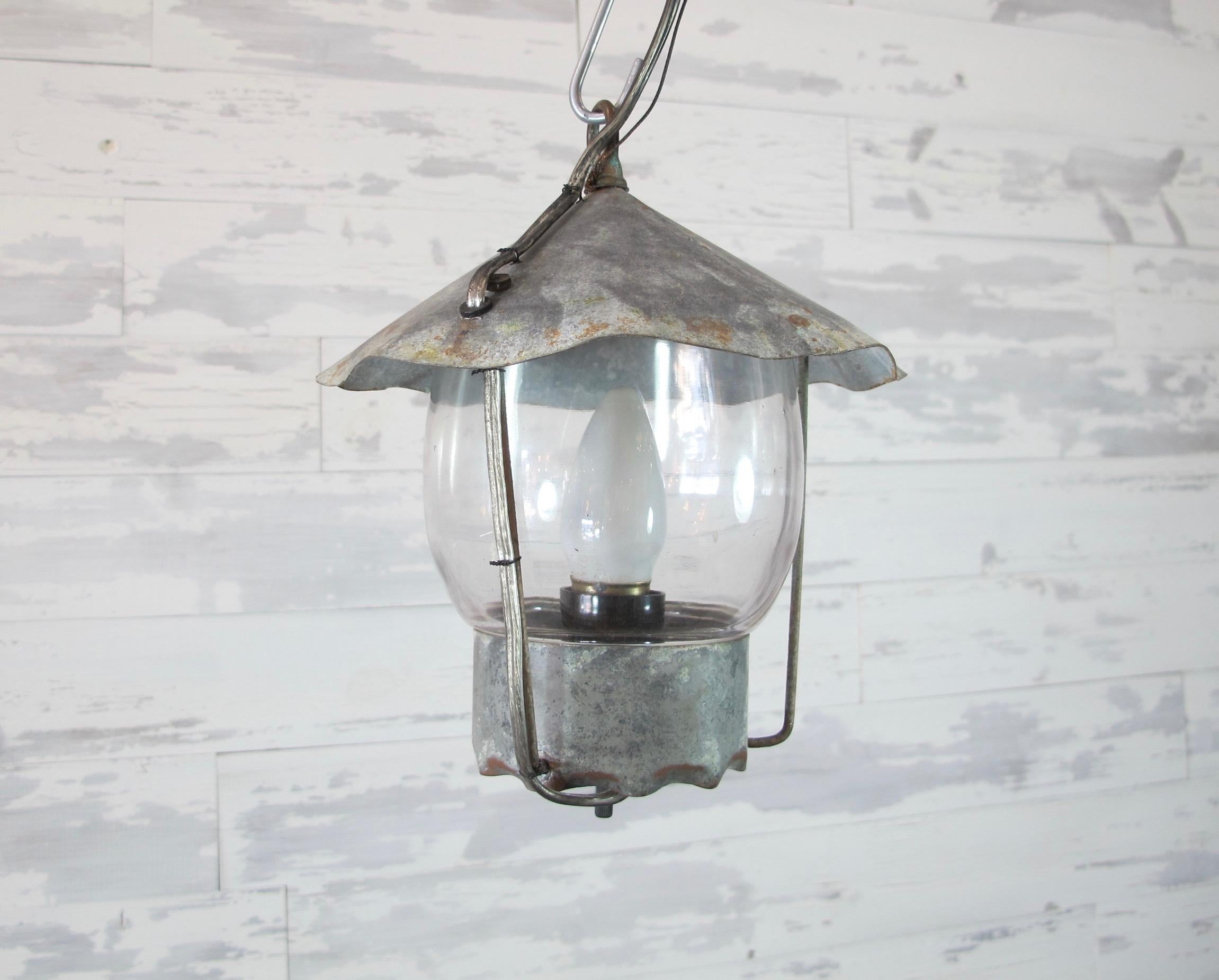 Great set of three small vintage galvanized lanterns with all original glass. Perfect for a beach cottage or a children's bunk room. These have been all re-wired and are UL approved, chain and canopy included. 12