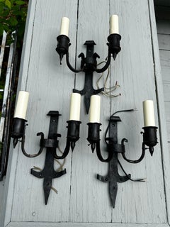 Set of three vintage iron and brass Bradley & Hubbard tudor style. Wall sconces