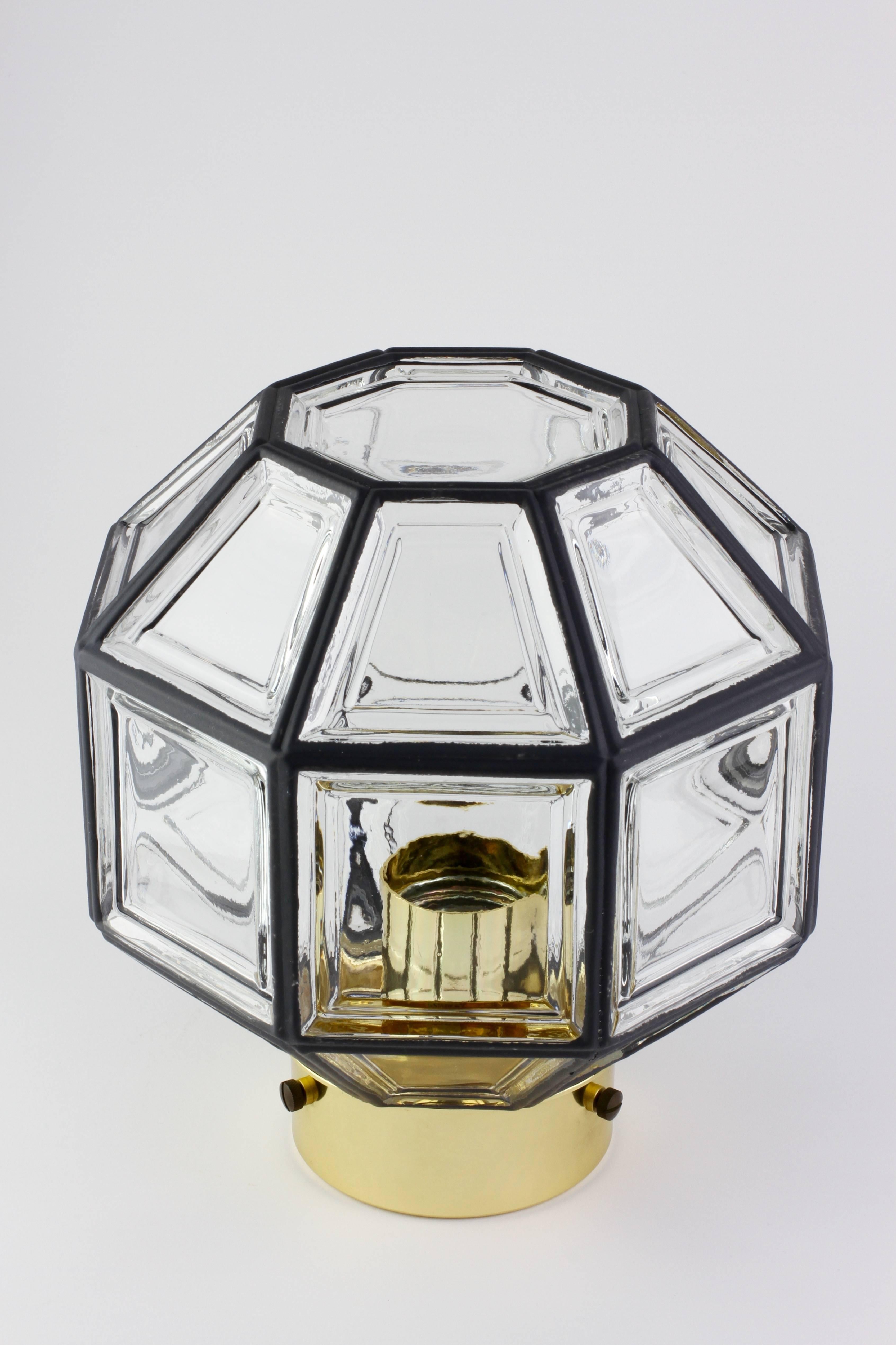Set of three octagonally shaped, midcentury Minimalist German made clear glass and polished brass flush mount light fixtures or lamps designed Hans Agne Jakobsson and made by Glashütte, Limburg, circa 1965. These Contemporary Art Deco and lantern