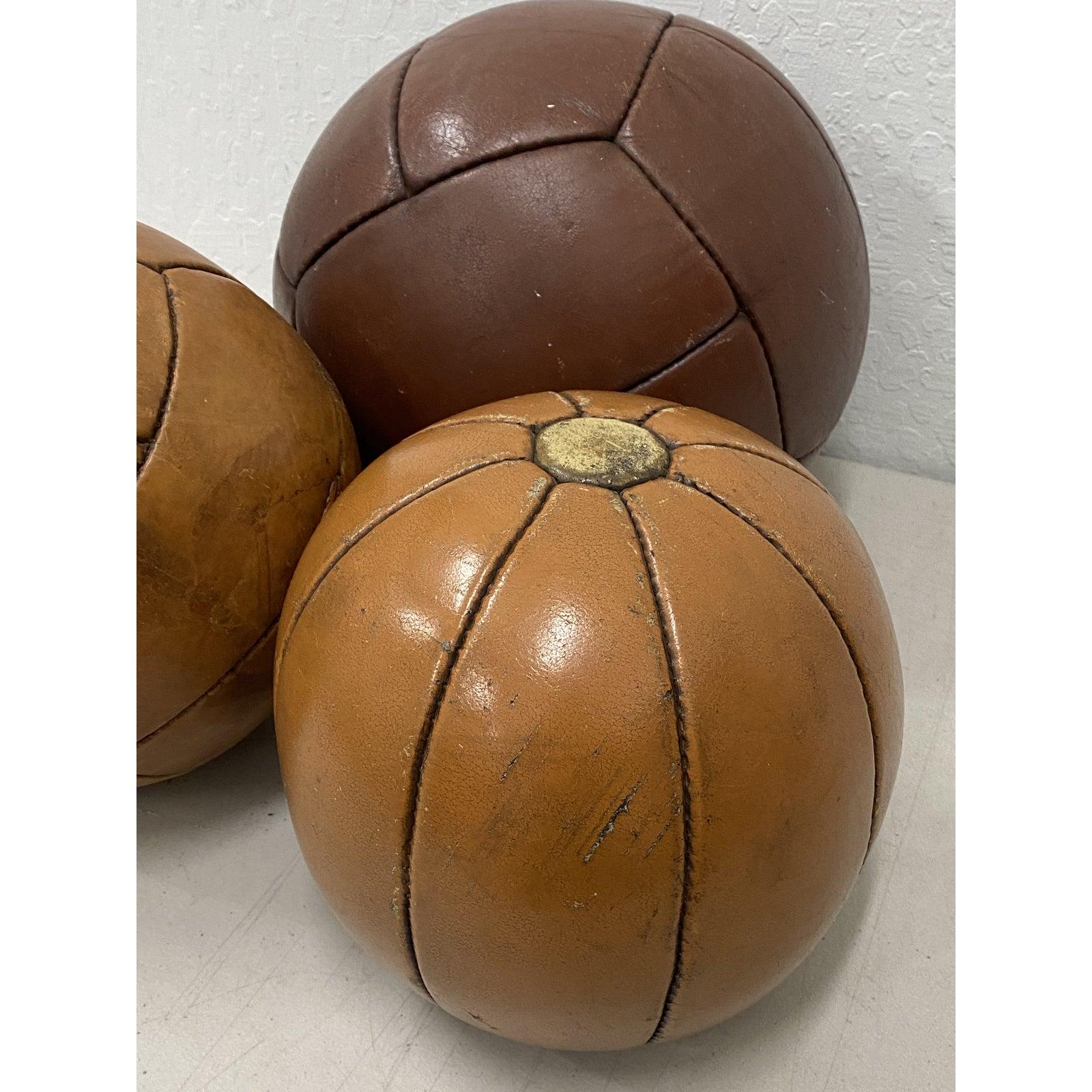 Set of three vintage leather medicine balls, circa 1940

Great collection of old school medicine balls.

Hippocrates is said to have stuffed animal skins for patients to toss for 