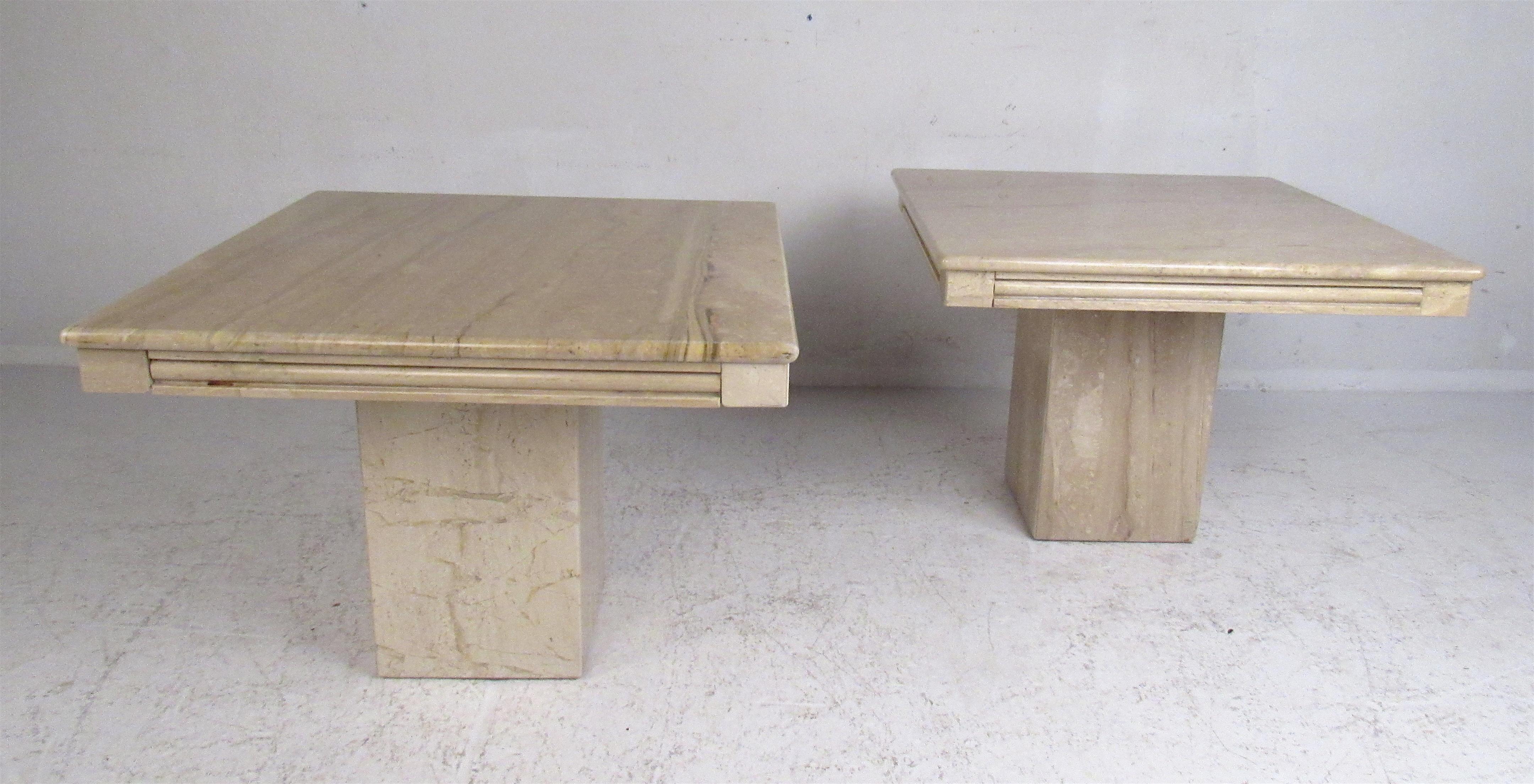 A beautiful midcentury set of three marble tables with a pedestal base. This stunning living room set includes a coffee table and two end tables. A wild design that is sure to make a lasting impression in any modern interior. Please confirm the item