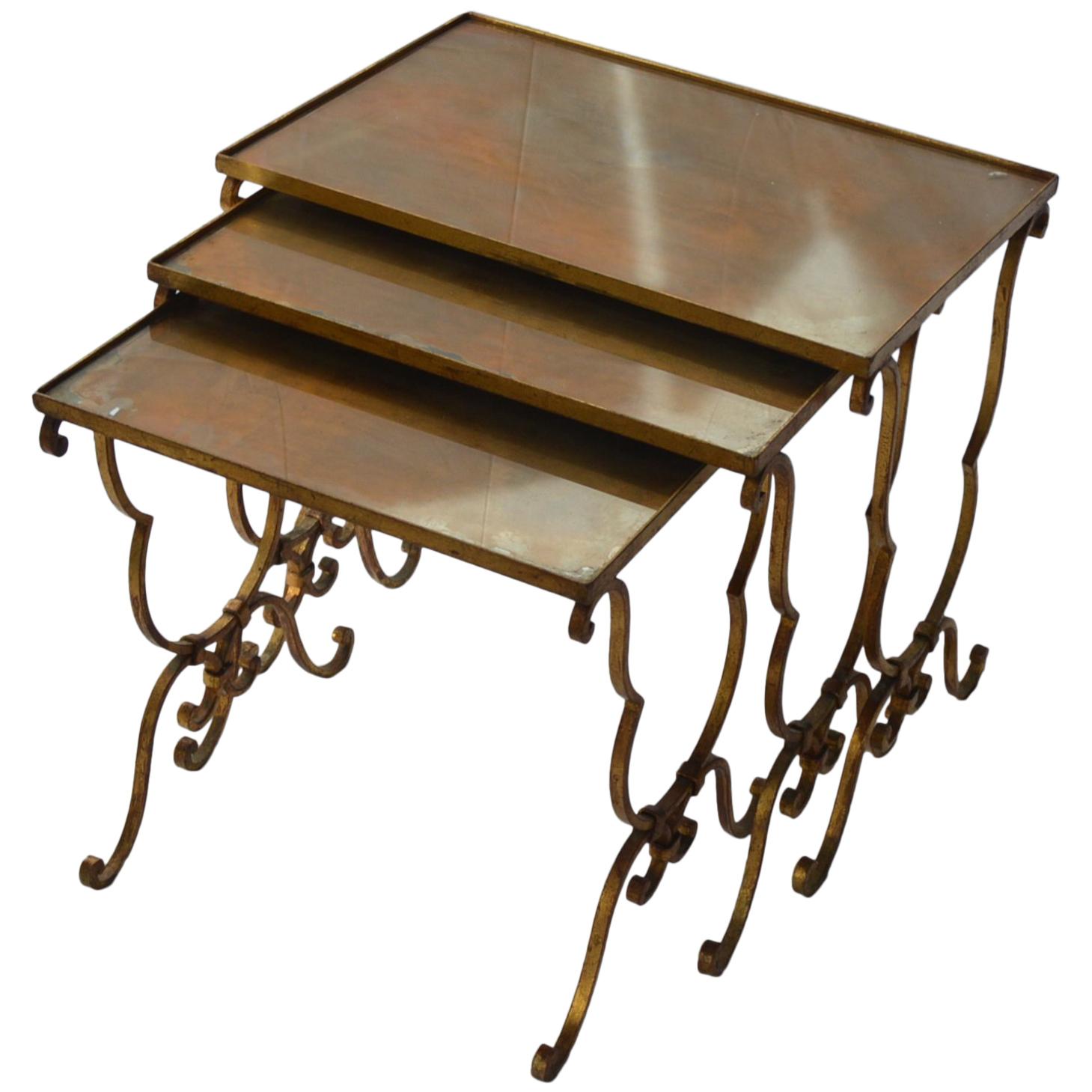 Set of Three Vintage Nesting Metal Mounted Tables with Oxidized Glass Top For Sale