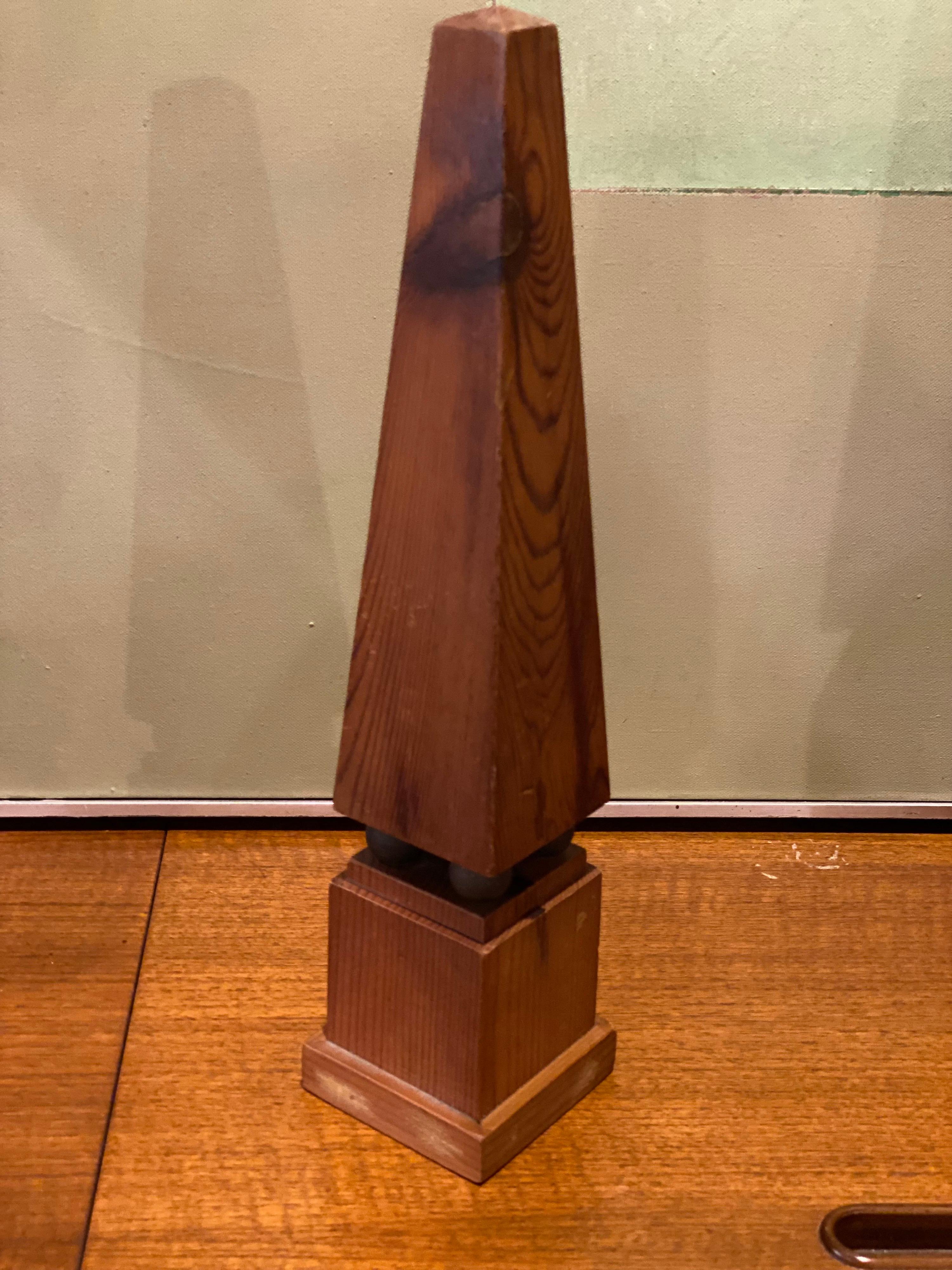 Set of three neoclassical style decorative wooden obelisks are in great overall condition. Larger size is listed below for shipping purposes, see small and medium sizes here:
Measures: Small - 3.13