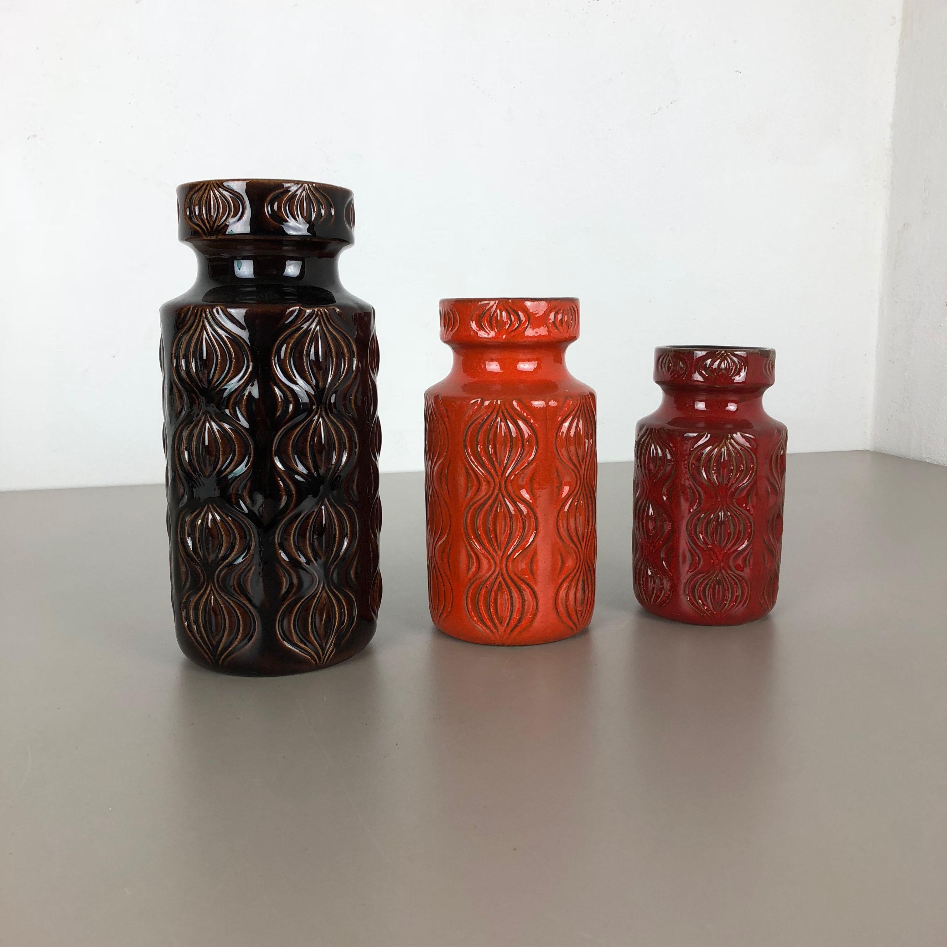 Article:

Set of two fat lava art vases

Model: Onion

Producer:

Scheurich, Germany



Decade:

1970s




These original vintage vases was produced in the 1970s in Germany. It is made of ceramic pottery in fat lava optic. Super