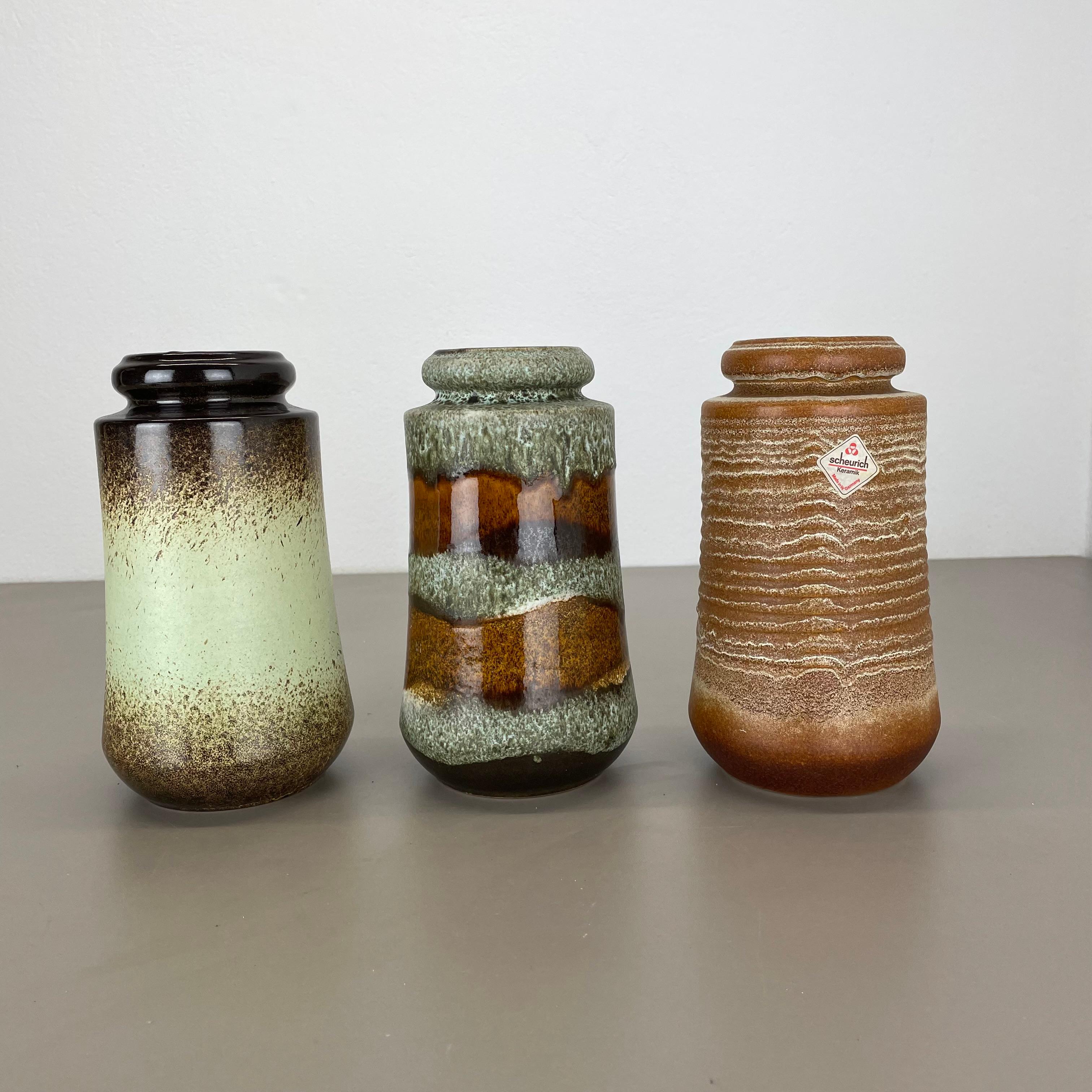 Article:

Set of three fat lava art vases


Producer:

Scheurich, Germany



Decade:

1970s


These original vintage vases was produced in the 1970s in Germany. It is made of ceramic pottery in fat lava optic. Super rare in this coloration. This set