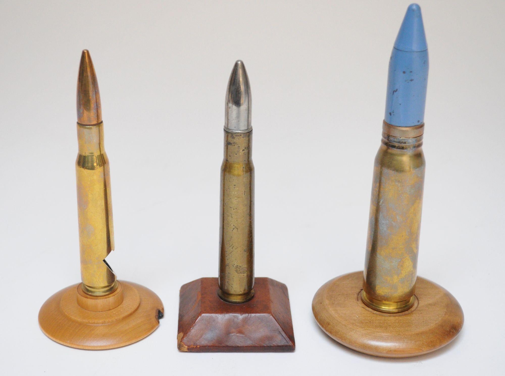 American Set of Three Vintage Trench Art Bullet Casing Paperweights and Flint Lighter For Sale