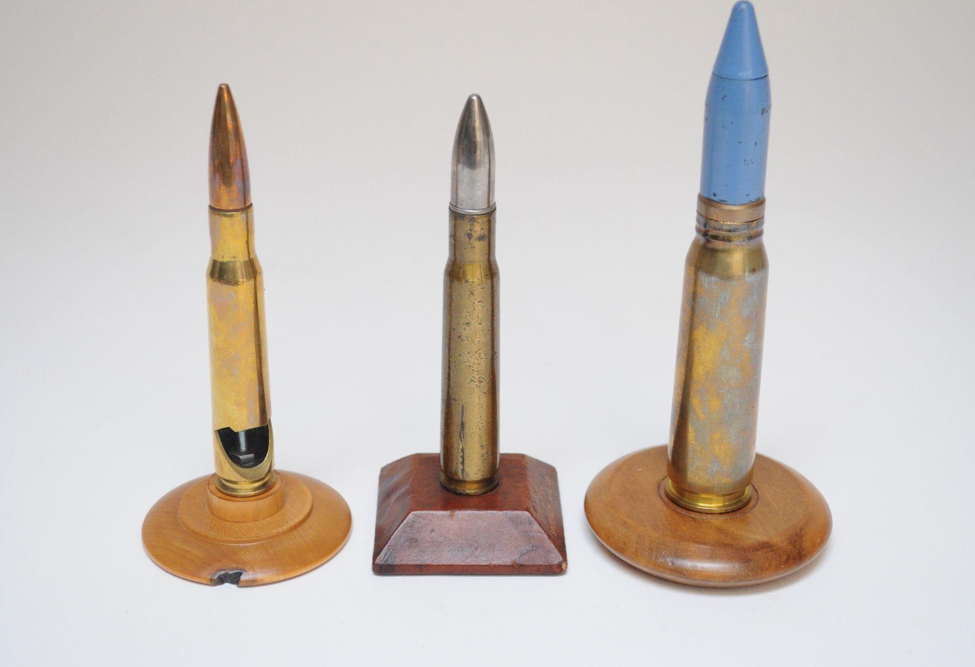 Set of Three Vintage Trench Art Bullet Casing Paperweights and Flint Lighter In Good Condition For Sale In Brooklyn, NY