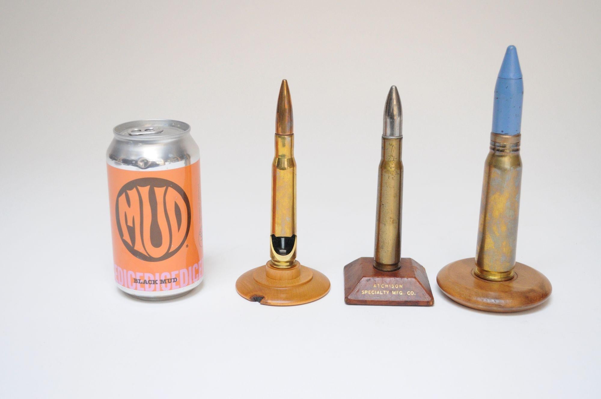 Set of Three Vintage Trench Art Bullet Casing Paperweights and Flint Lighter For Sale 1