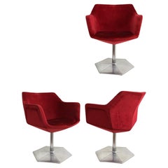 Set di quattro sedie girevoli Voitto Haapalainen "Prisma" con scocca sfaccettata.