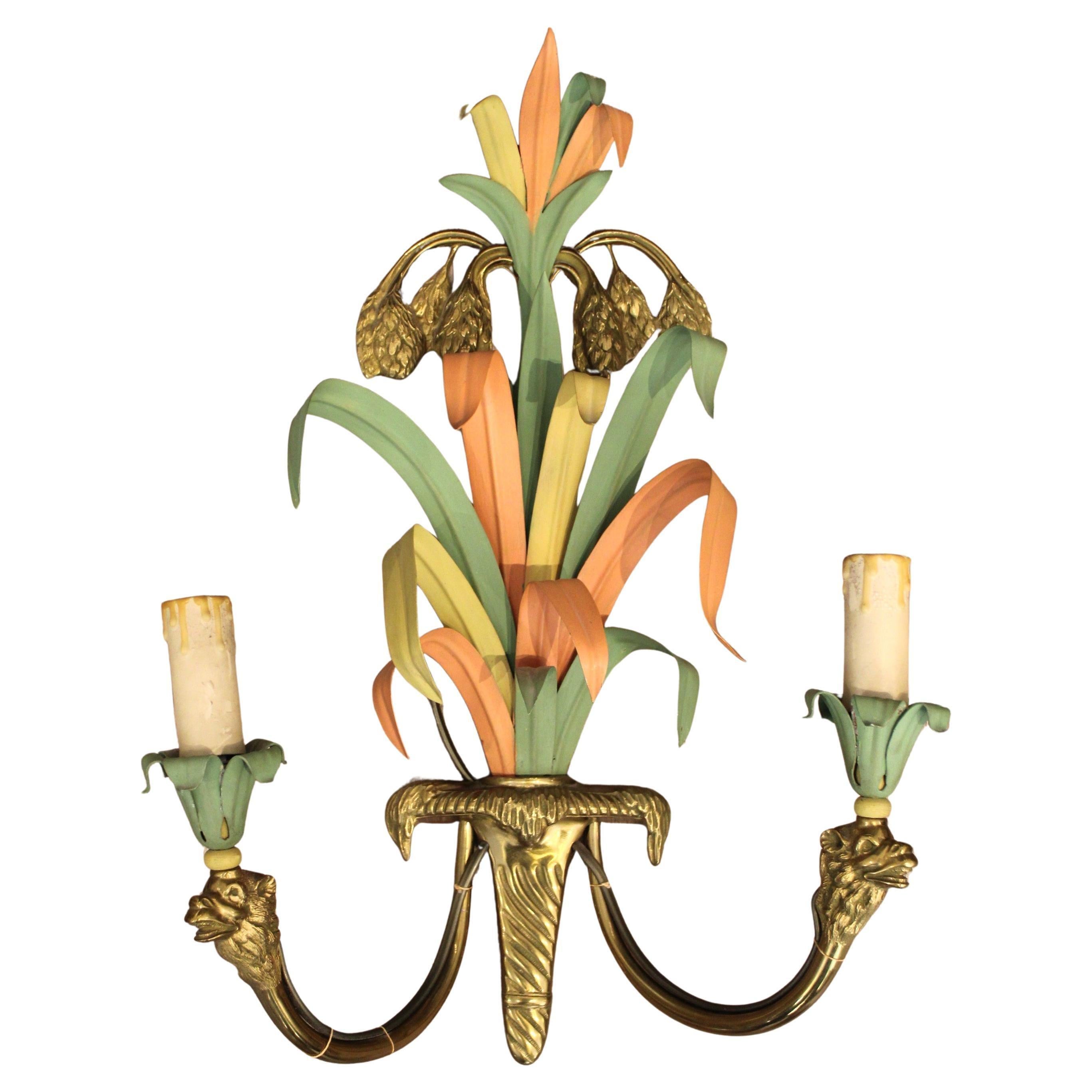 Set of three wall lights by Maison Baguès
Bronze and polychrome painted metal, decorated with palm leaves and camel heads
France, circa 1950
