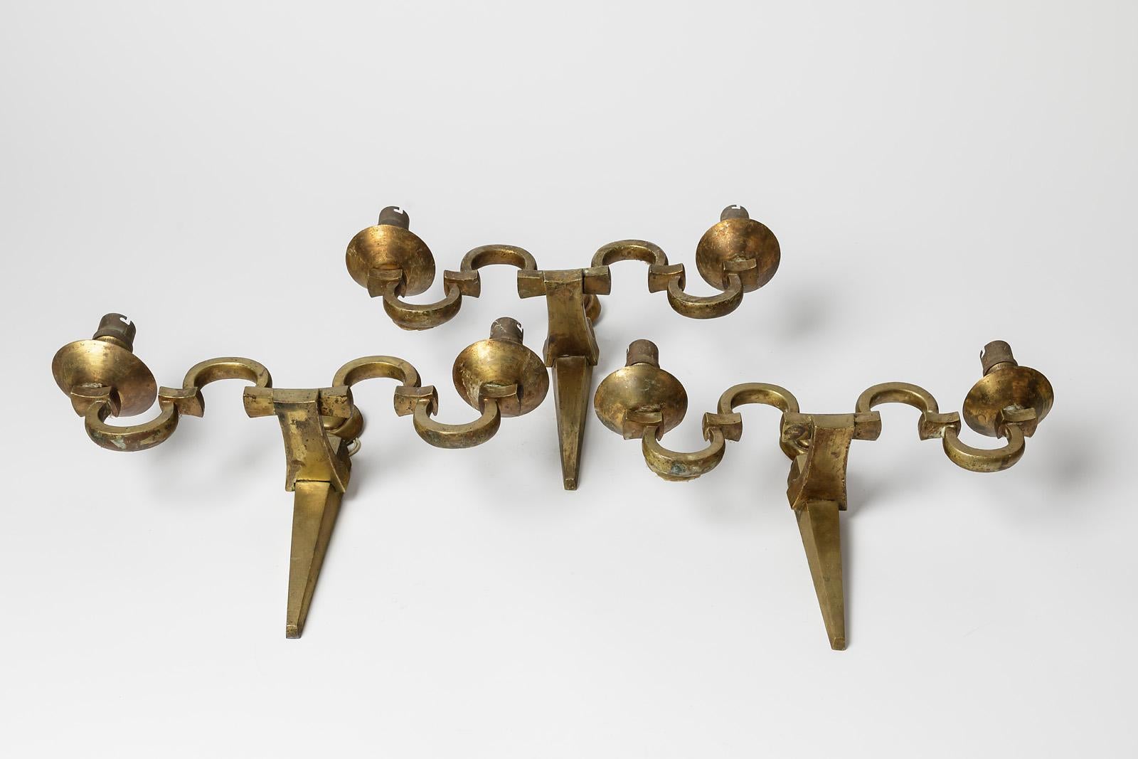 Nach dem Vorbild von Maison Jansen

Art deco 1940 Metall golden Messing Wandleuchten

Satz mit drei Wandleuchten

Original guter Zustand

Maße: Höhe 25 cm
Groß 35 cm
Tiefe 10 cm.