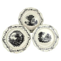Juego de tres platos de cerámica cremosa de Wedgwood Grabados de paisajes Inglaterra Siglo XVIII