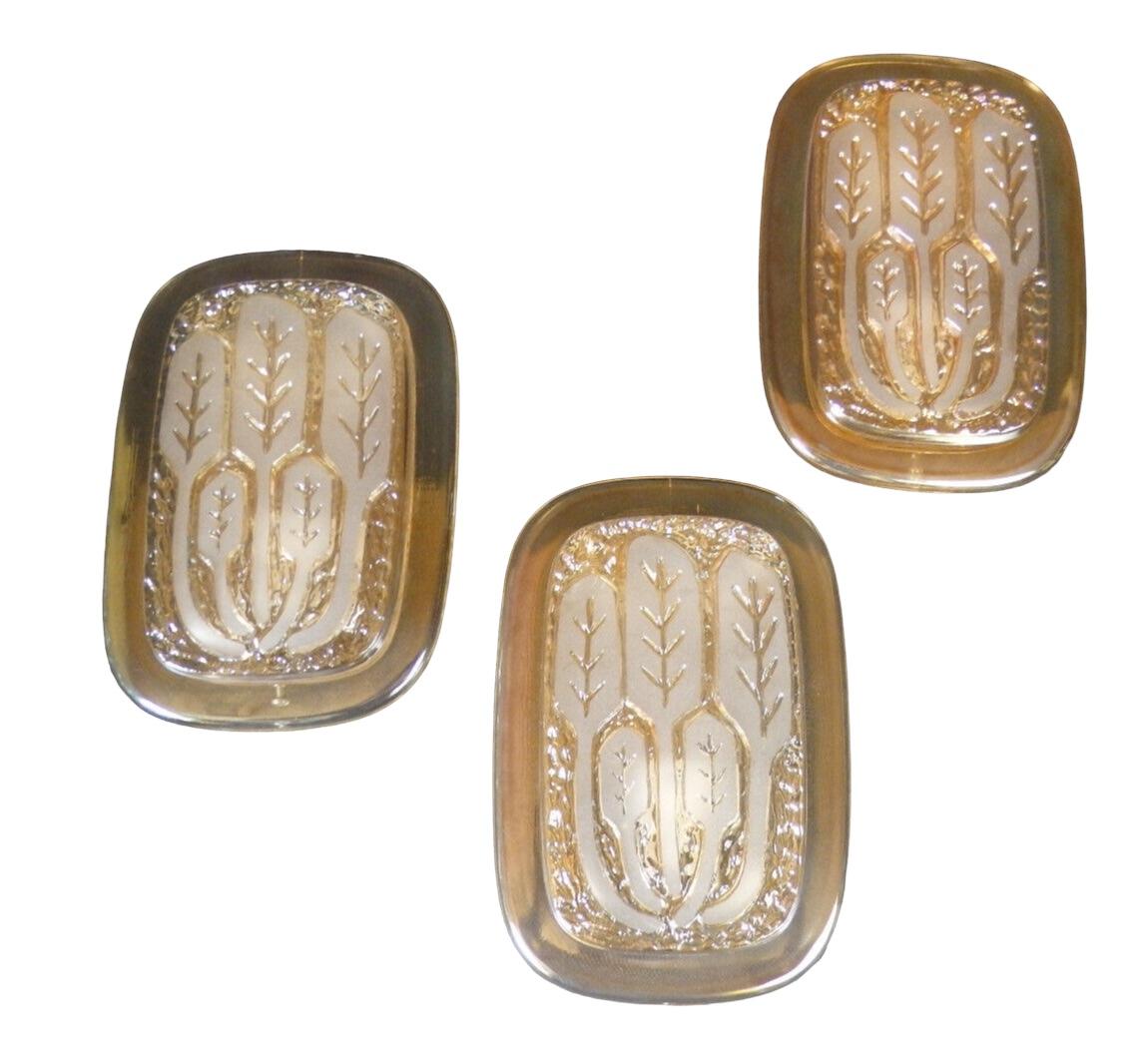 A set of three wall lights by manufacturer Hillebrand Leuchten, Germany. Original modernist German wall light from the 1970s in high quality glass  with wheat sheaf motif. This extremely rare set of wall lights was manufactured by Hillebrand