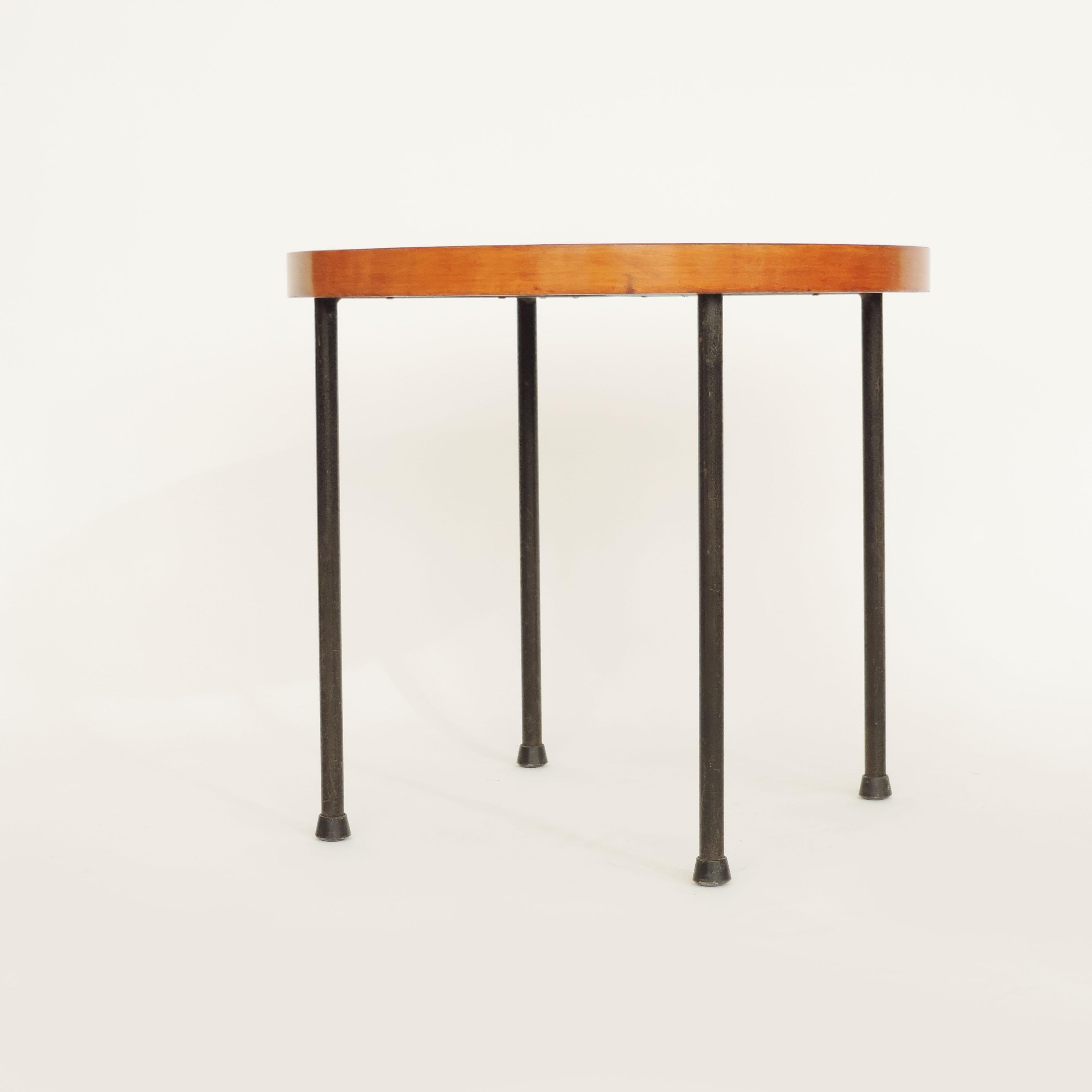 Set of three wood and metal side tables France or Italy, 1950s.