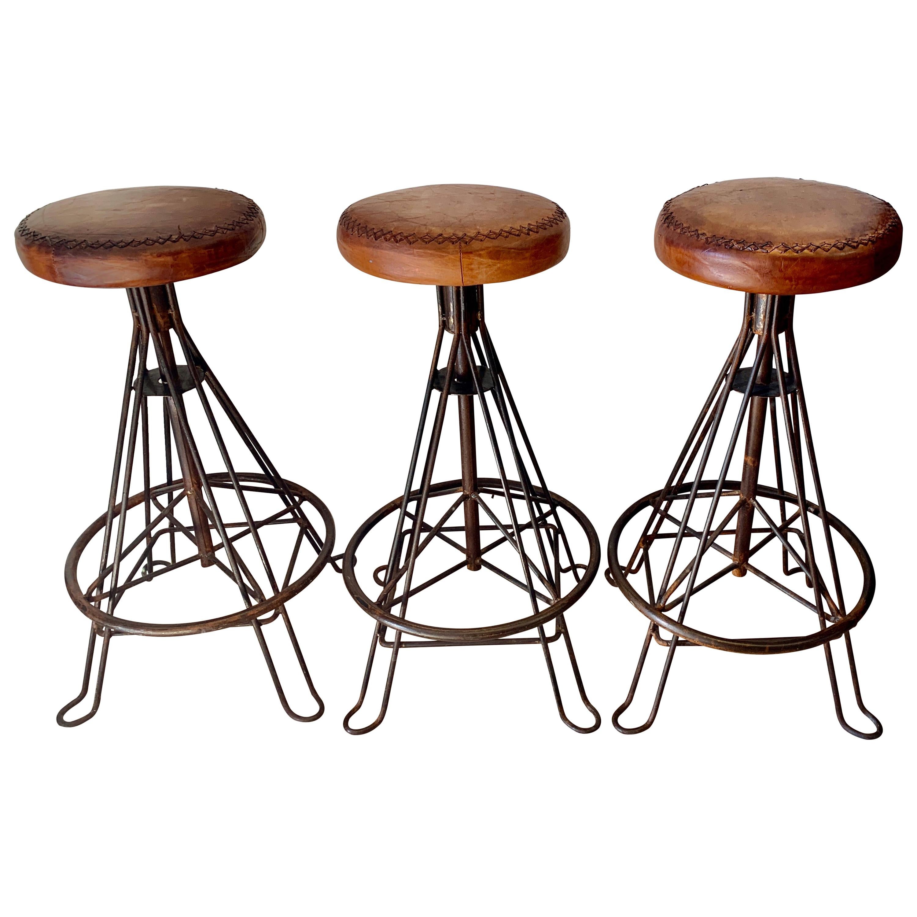Set of Three Wrought Iron and Stitched Leather Bar Stools For Sale