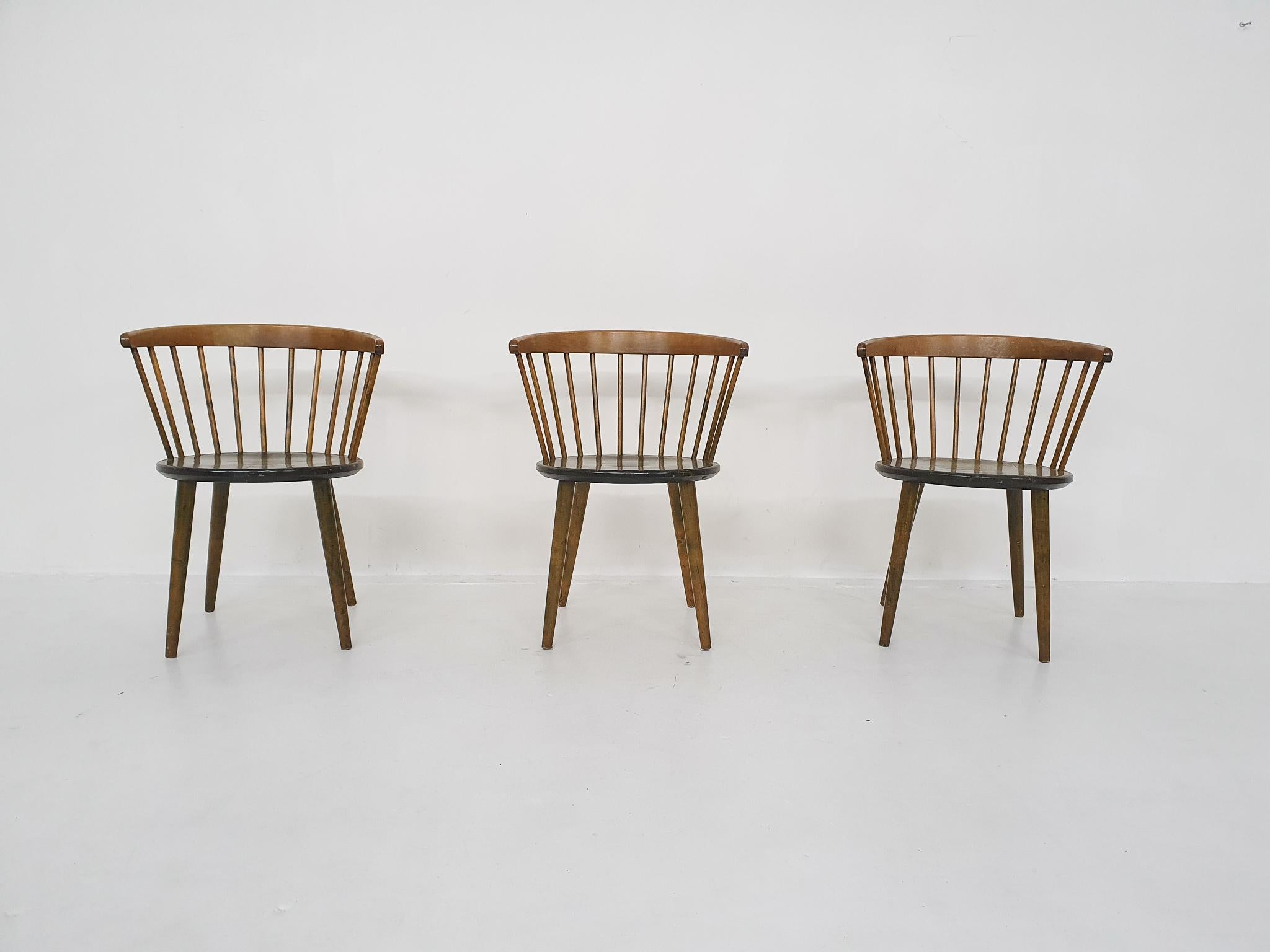 3 dark oak spindle back chairs by Yngve Ekstrom for Nesto.