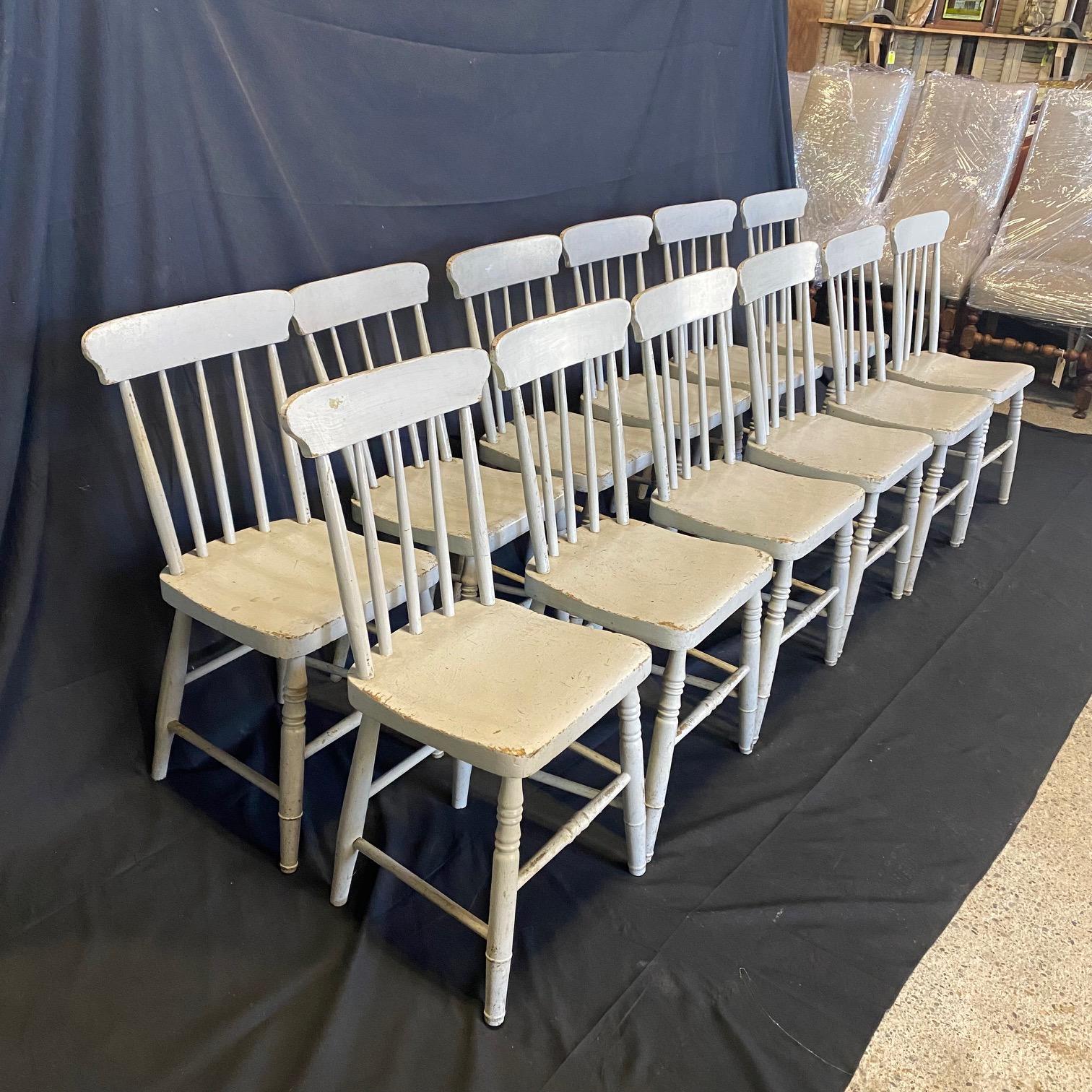 Classic sturdy plank seat oak grange chairs with early gray paint, from a grange in Maine. Will break up the set if desired.

#5718.