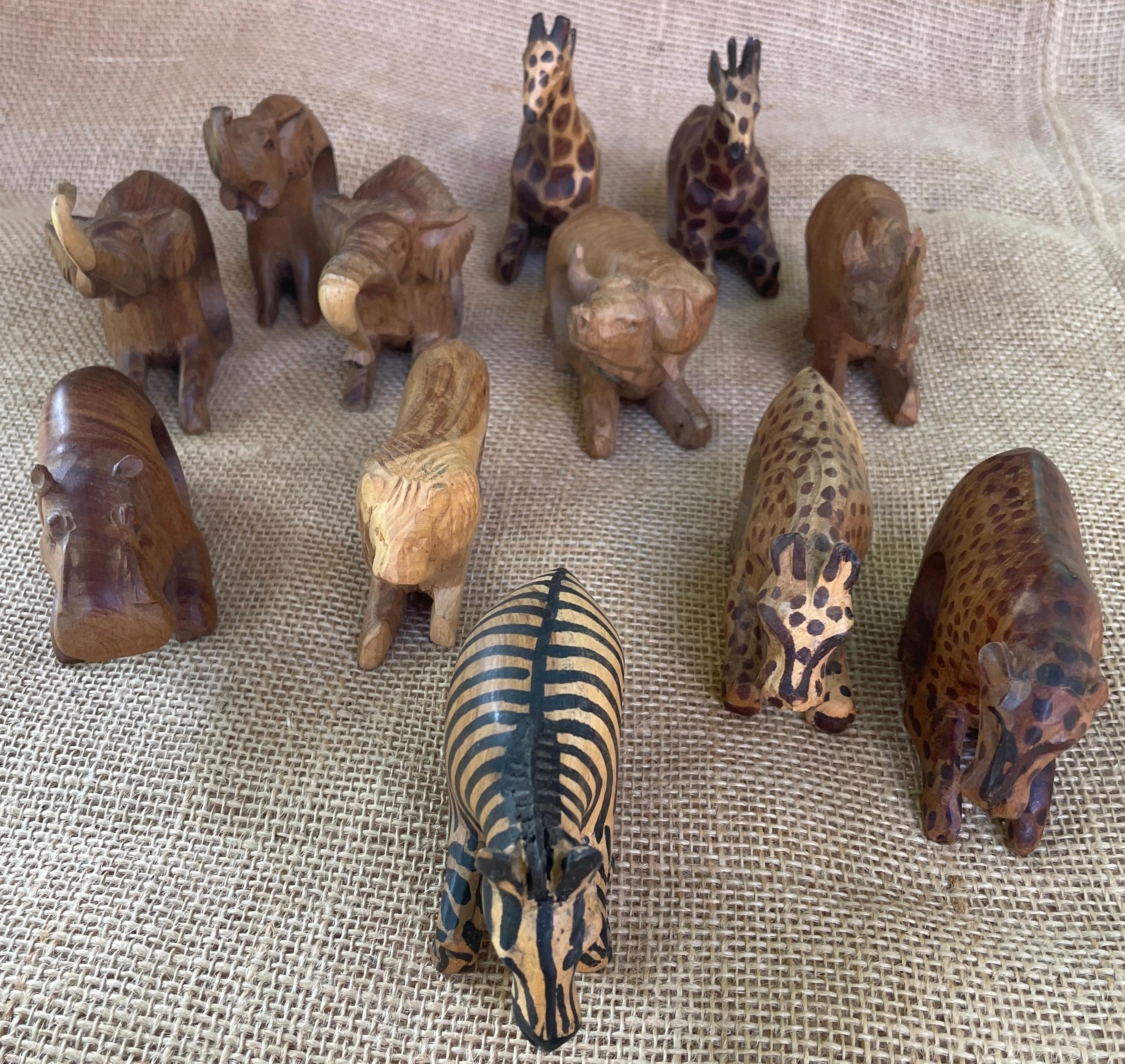 Hand-Carved Set of Twelve African Safari Napkin Rings For Sale