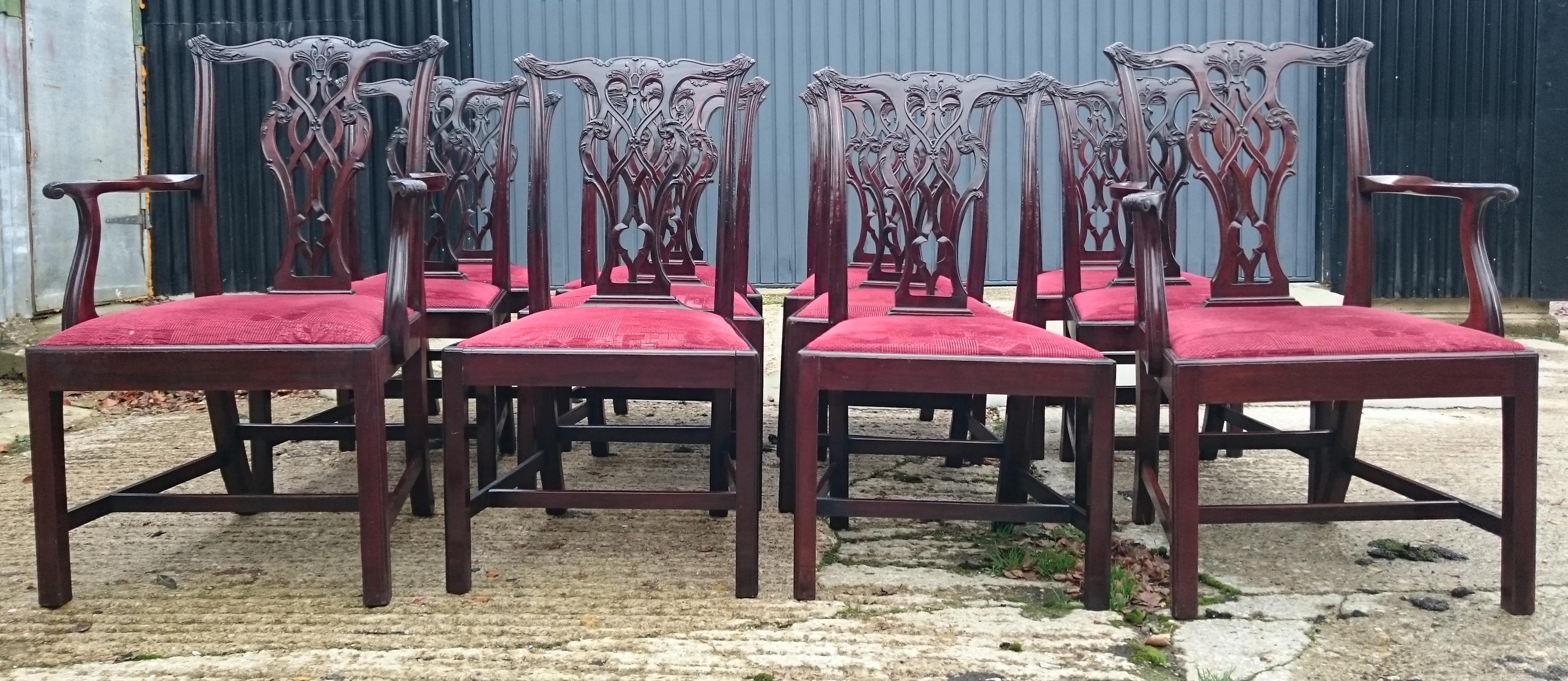 Fine quality set of twelve antique dining chairs made by Edwards and Roberts of London. These chairs are a grand scale which makes them better able to accomodate the modern diner than a period chair. They are strong, with H frame stretchers for