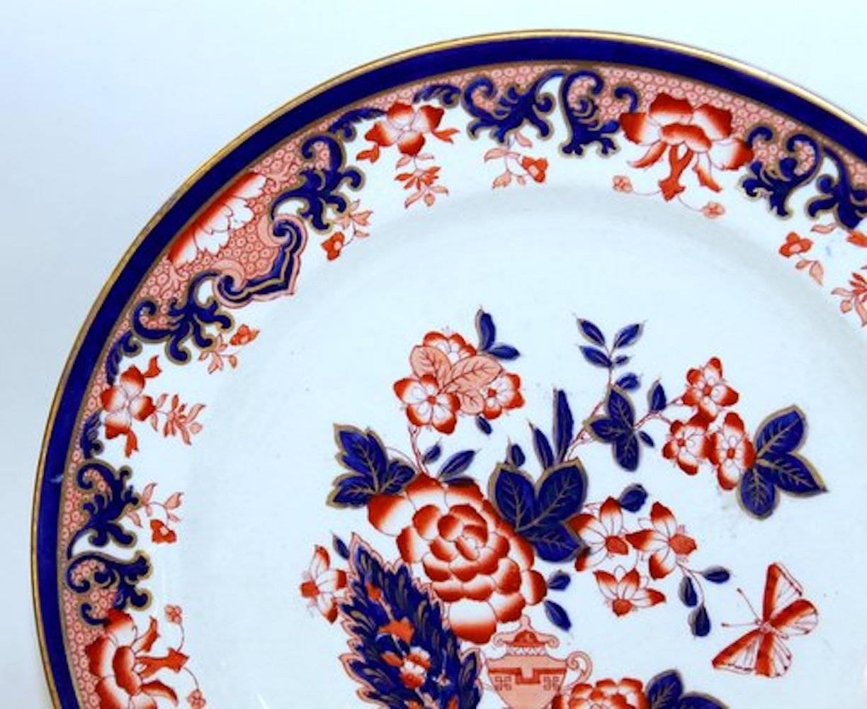 Set of 10 antique English hand-painted Imari decor ironstone dinner plates

Impressed Cadeuceus mark for well-known maker, Bishop &
Stonier of Hanley (Staffordshire). Some wear, slight marks from use
but no chips, cracks or restoration.
 