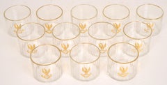 Set of 12 Armorial Straight Facet-Cut 24 Panel Gilt Decorated Crystal Glasses