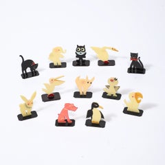Set of Twelve Art Deco Graphic Animal Cutout Bakelite Place Card Holders