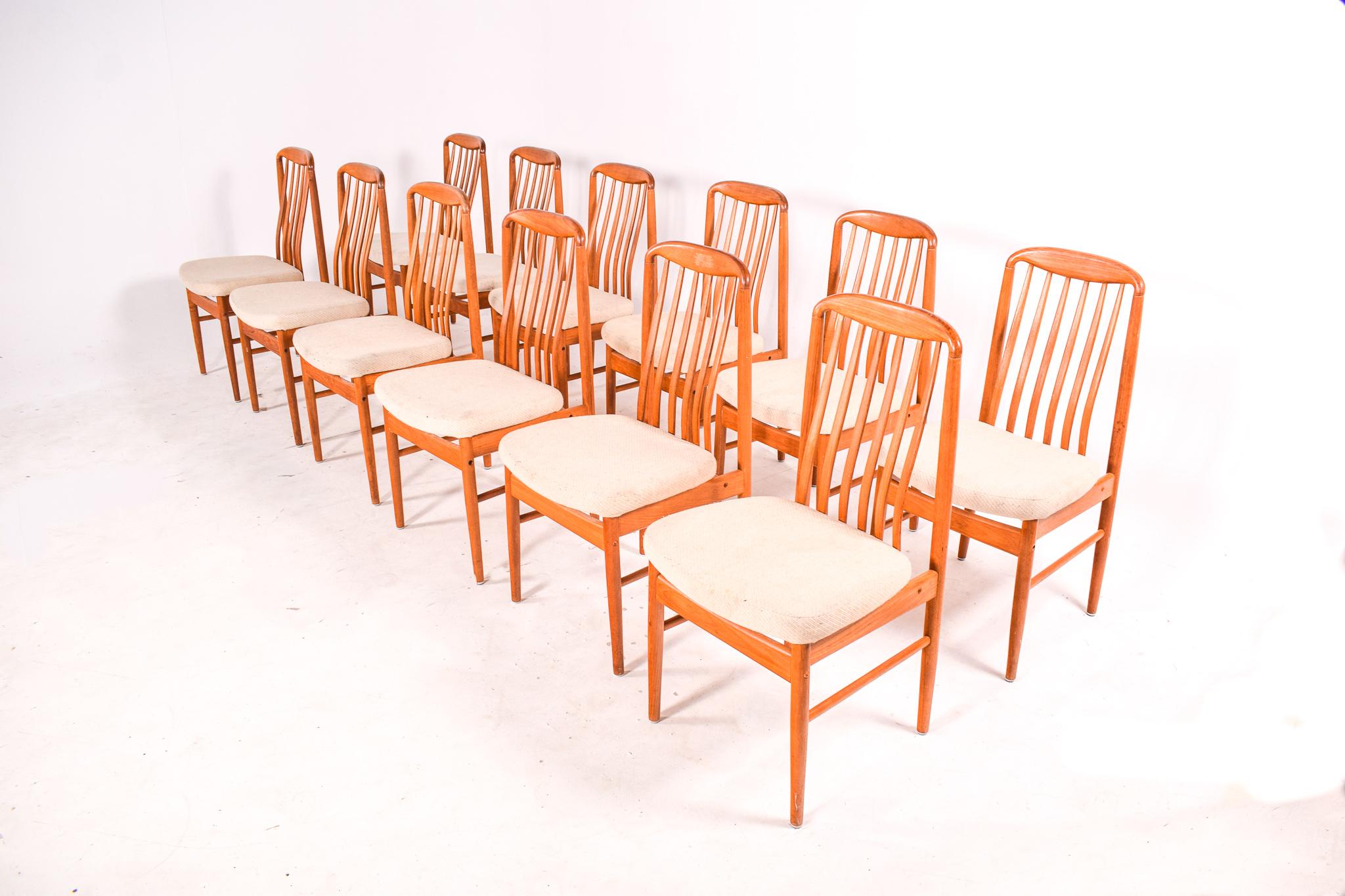 This set of twelve BL10 Sanne chairs, designed in the 1970s by Danish designer Benny Linden, is a splendid example of Scandinavian design's influence extending beyond its borders, having been manufactured in Thailand. The chairs are a testament to