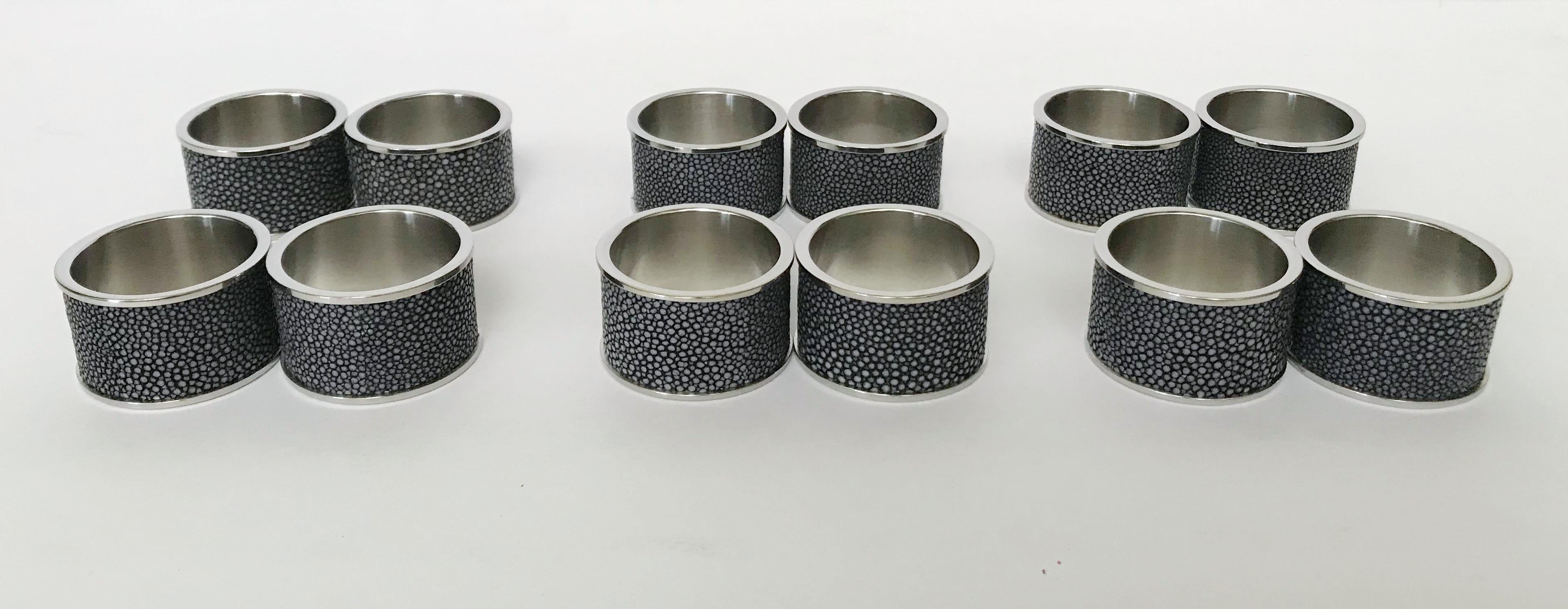 Italian black shagreen and stainless steel napkin rings with matching black leather boxes designed by Fabio Bergomi for Fabio Ltd / Made in Italy 
Each ring has diameter 1.5 inches and width 1 inch
LAST SET OF 12 RINGS (2 per box) in stock in Los