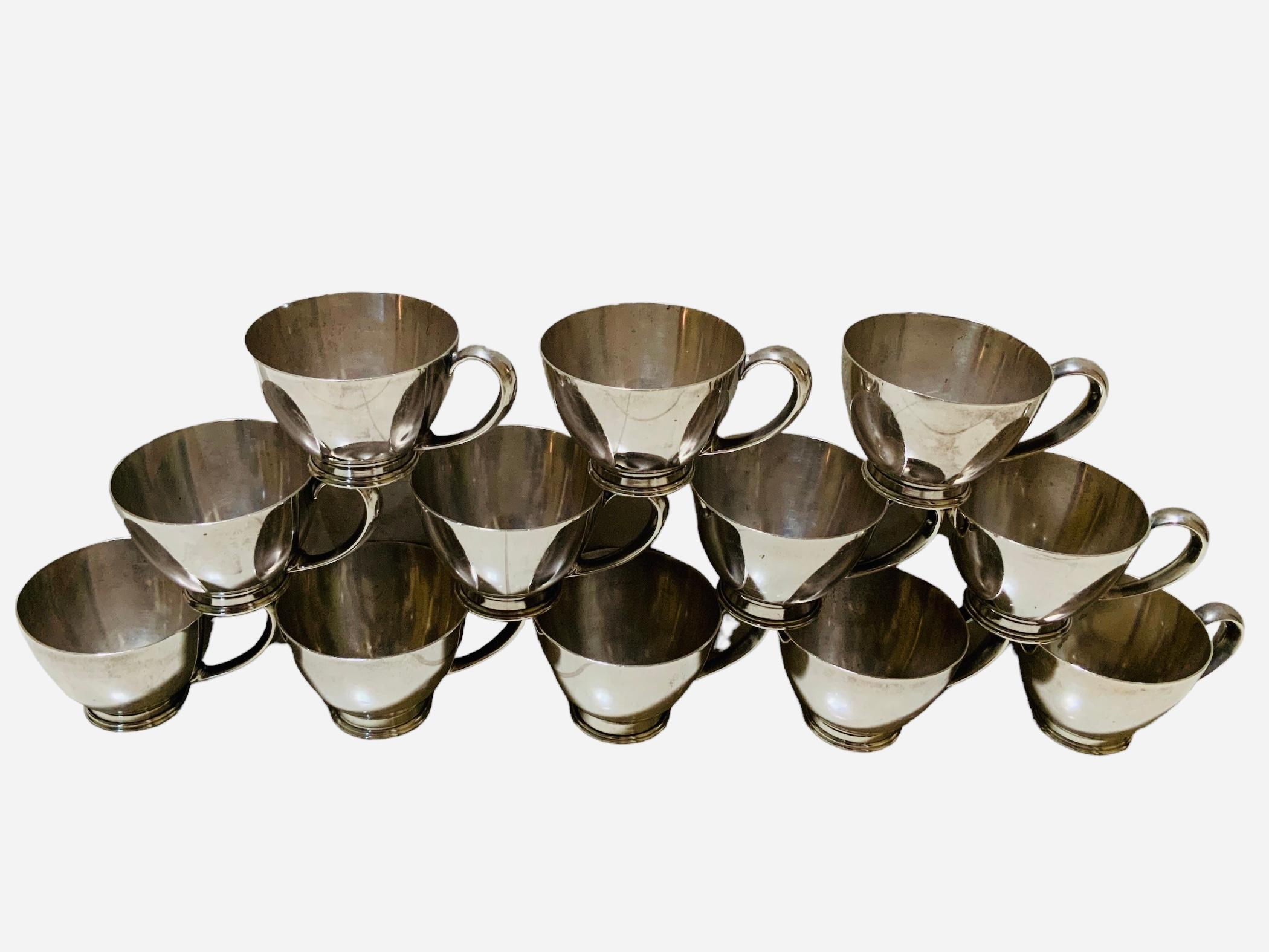 Sterling Silver Set Of Twelve Cartier Sterling Cups For Sale
