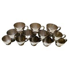 Set Of Twelve Cartier Sterling Cups