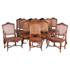Set of Twelve Carved Walnut Louis XV Style Dining Chairs