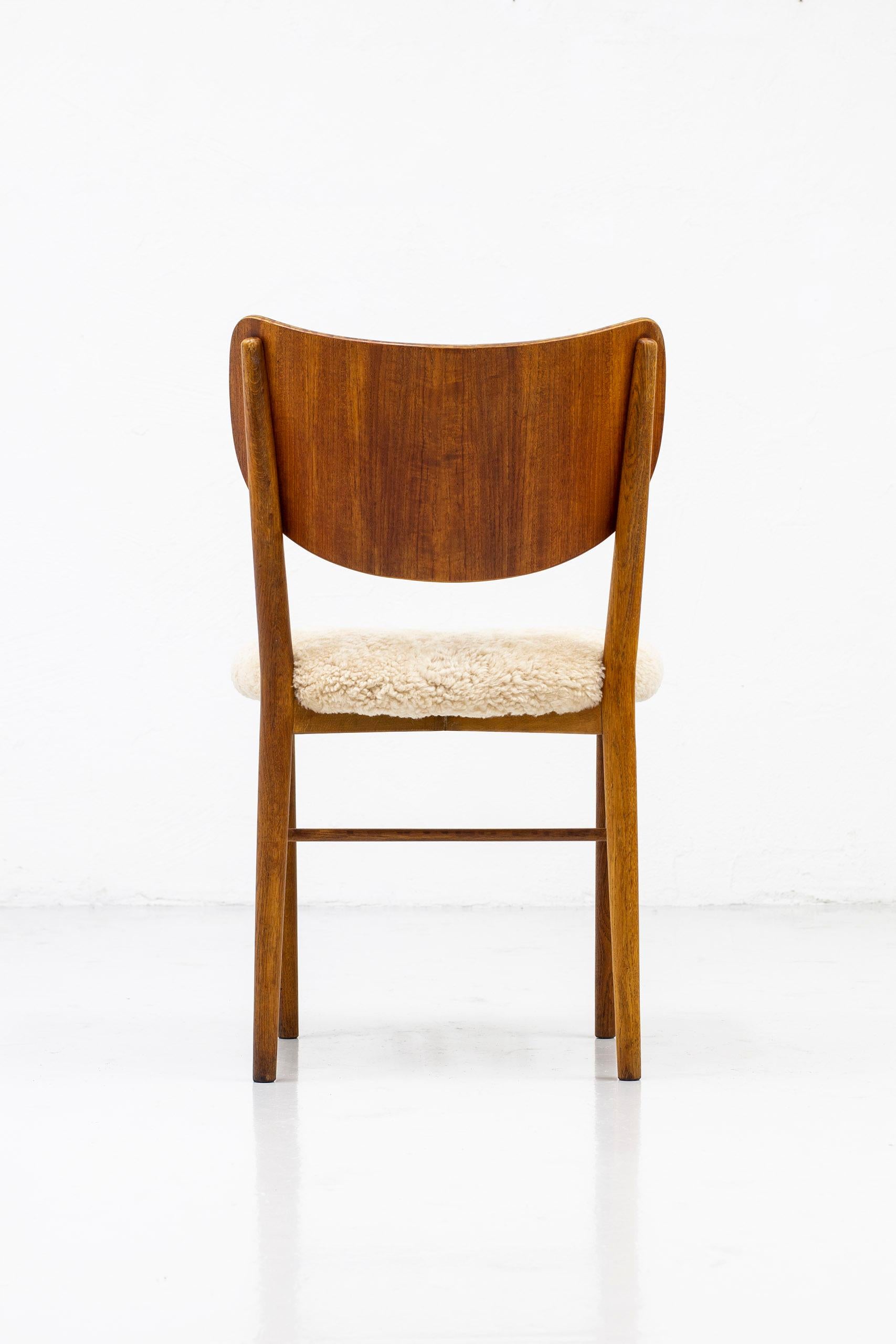 Set of Twelve Chairs in Teak and Oak with Sheepskin by Nils & Eva Koppel 11