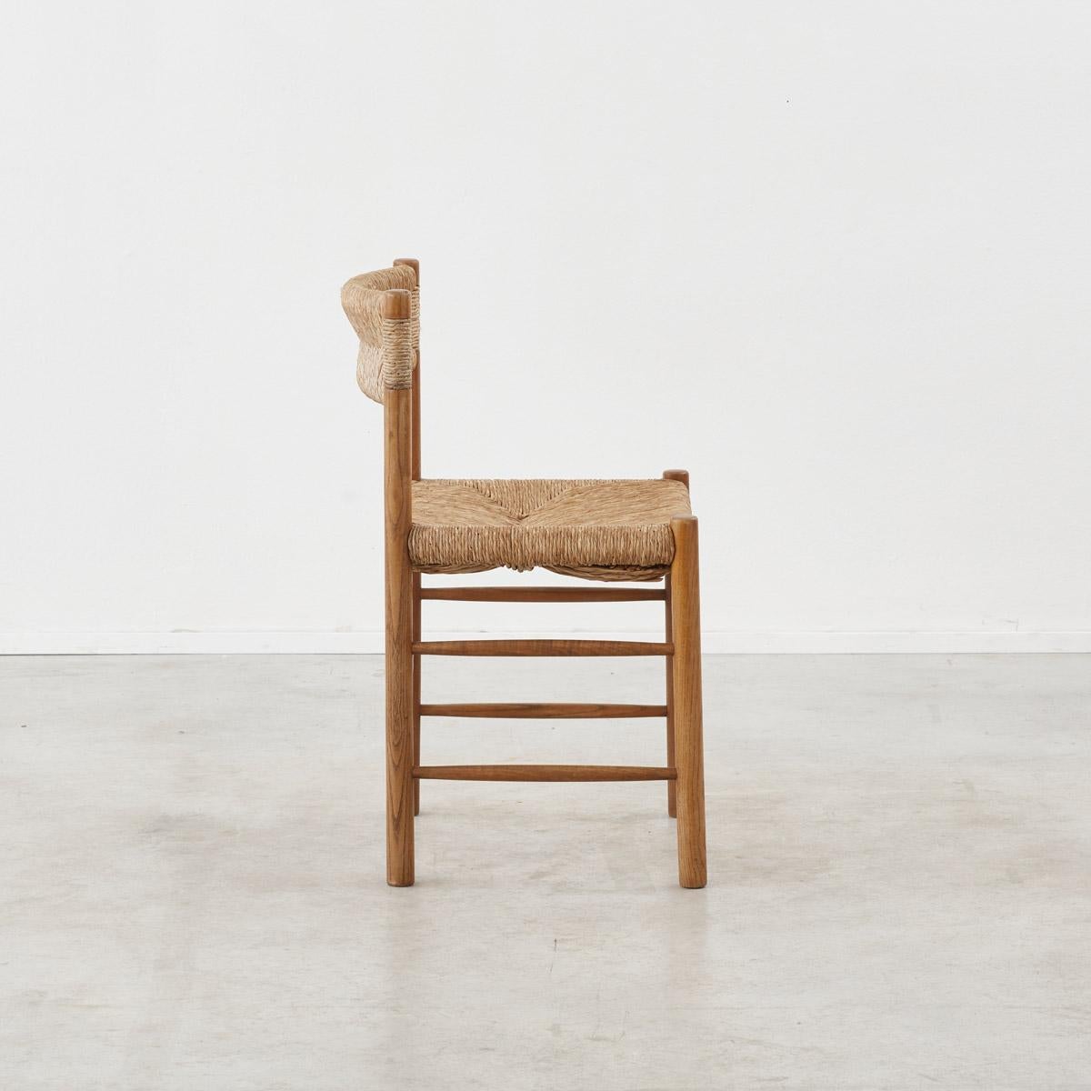 Woven Set of twelve Charlotte Perriand Dordogne Chairs for Robert Sentou, France c1950 For Sale