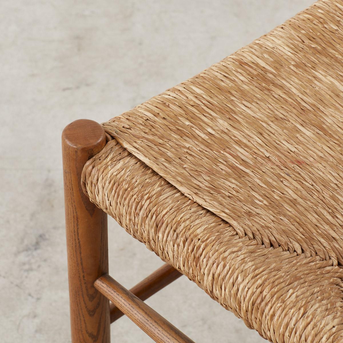 Straw Set of twelve Charlotte Perriand Dordogne Chairs for Robert Sentou, France c1950 For Sale