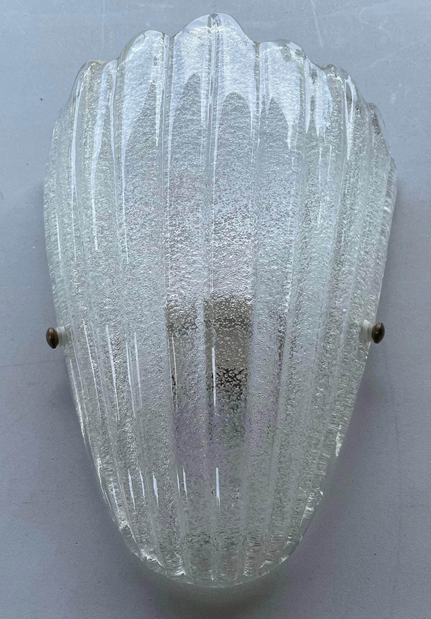 Vetro di Murano Set di dodici sculture in vetro di Murano con scudo Graniglia trasparente. Italia, anni '60. in vendita