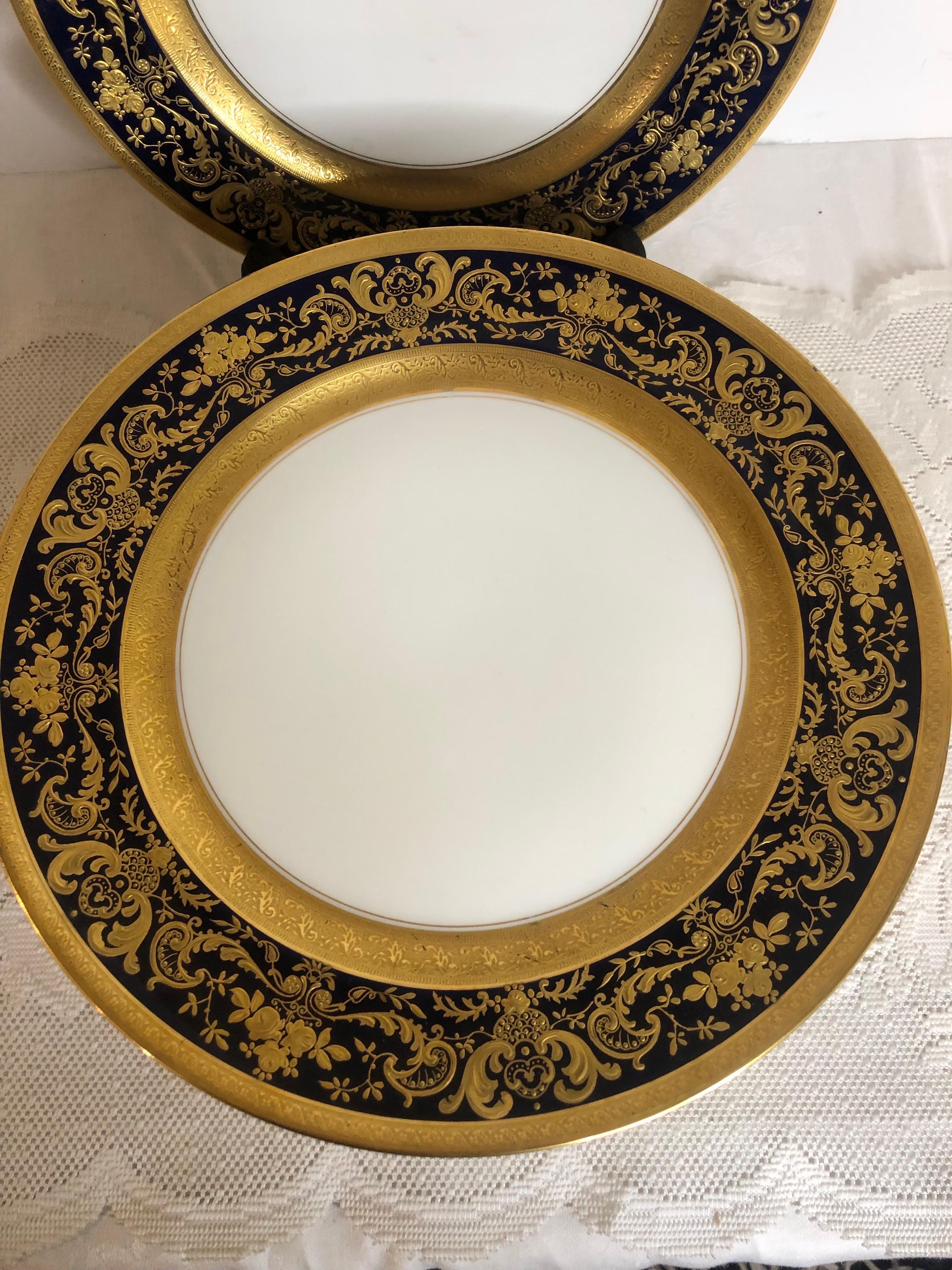 Set of Twelve Cobalt Rim Limoges Dinner Plates with Profuse Raised Gilding In Good Condition In Boston, MA