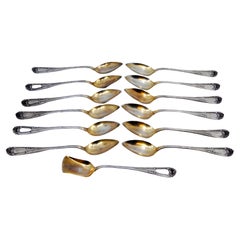 Set of twelve coffee spoons
sugar shovel in gilded silver w/ embossed handles