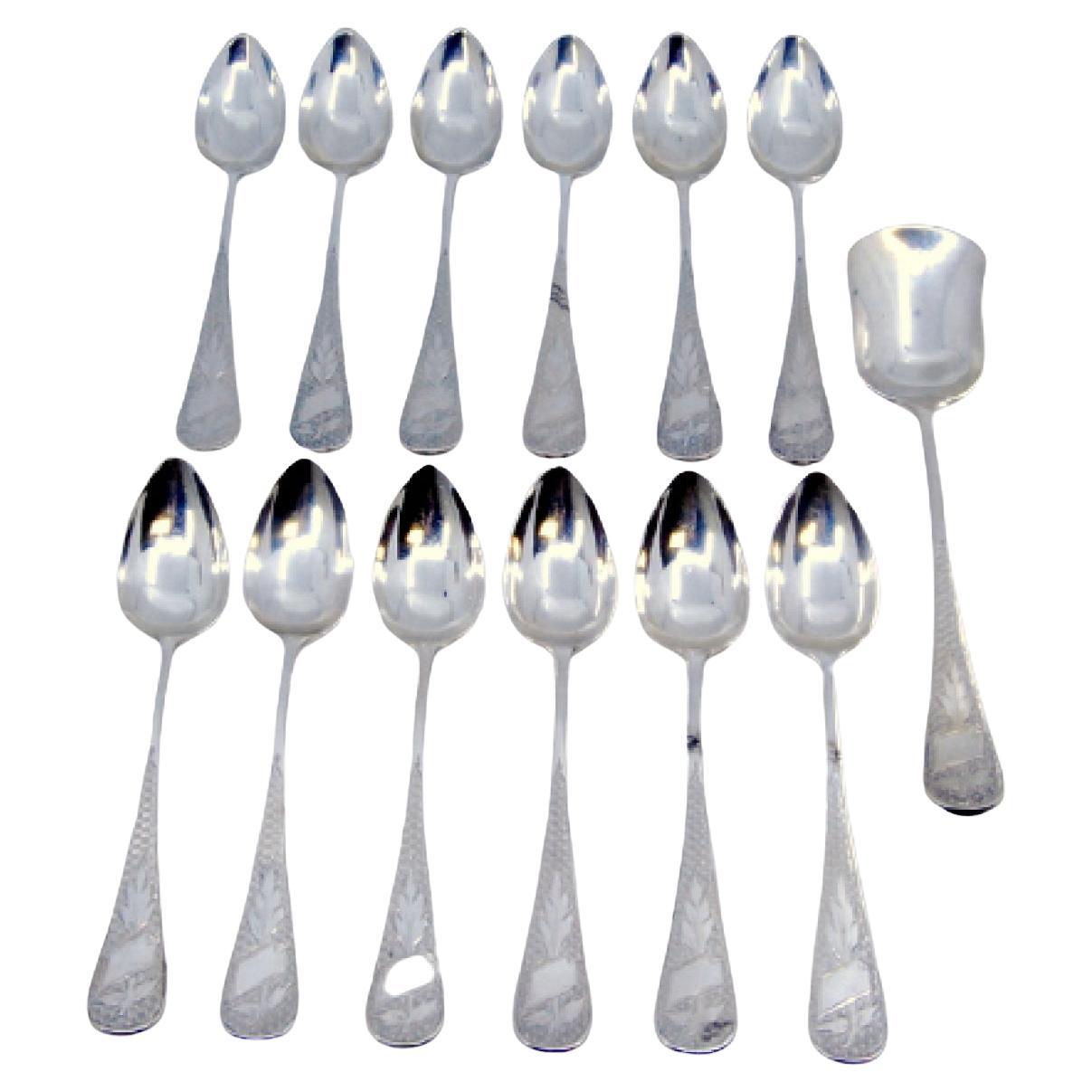 Set of twelve coffee spoons
sugar shovel in guilloche silver w/ monogram cards