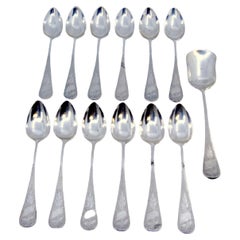 Set of twelve coffee spoons
sugar shovel in guilloche silver w/ monogram cards