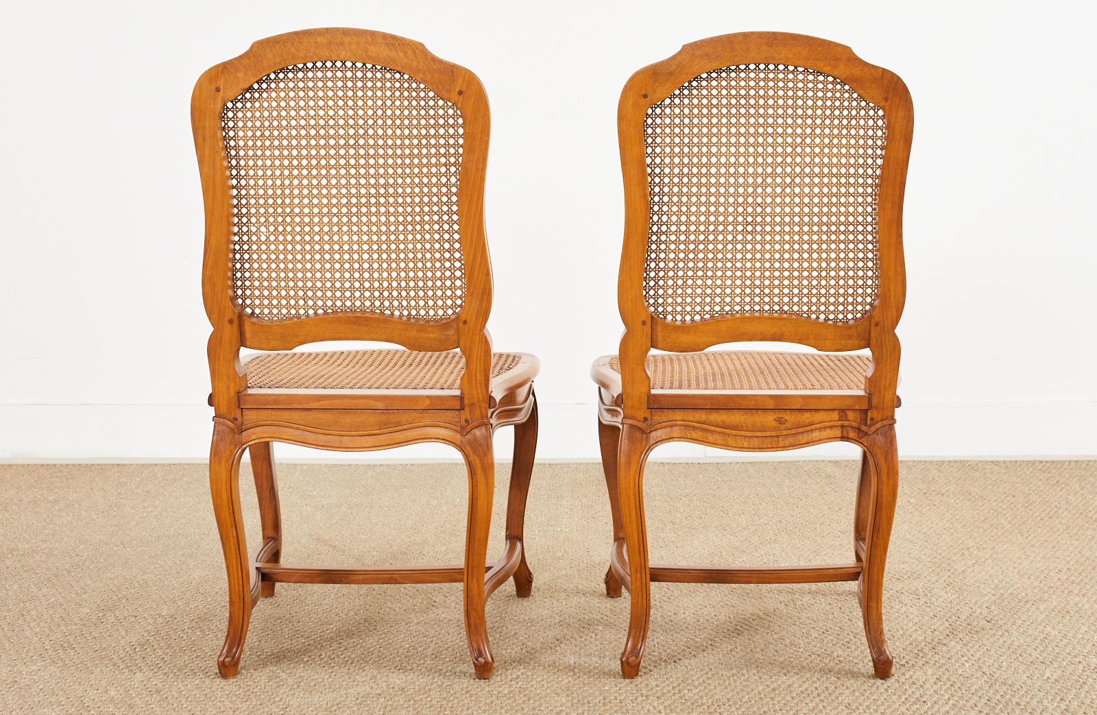 Set of Twelve Country French Provincial Fruitwood Caned Dining Chairs 14
